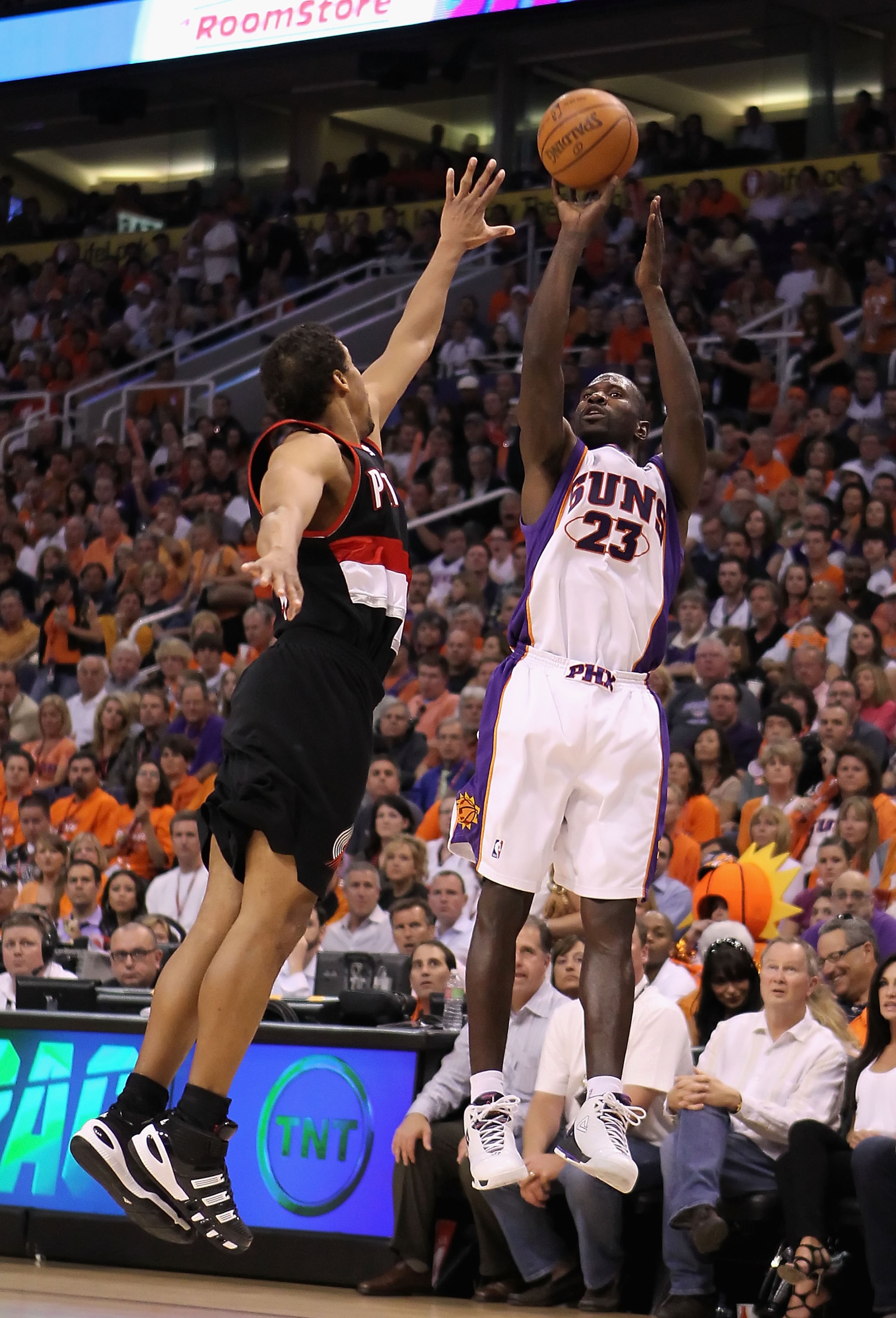 PHOENIX - APRIL 26:  Jason Richardson #23 of the Phoenix Suns puts up a shot over Andre Miller #24 of the Portland Trail Blazers during Game Five of the Western Conference Quarterfinals of the 2010 NBA Playoffs at US Airways Center on April 26, 2010 in Ph