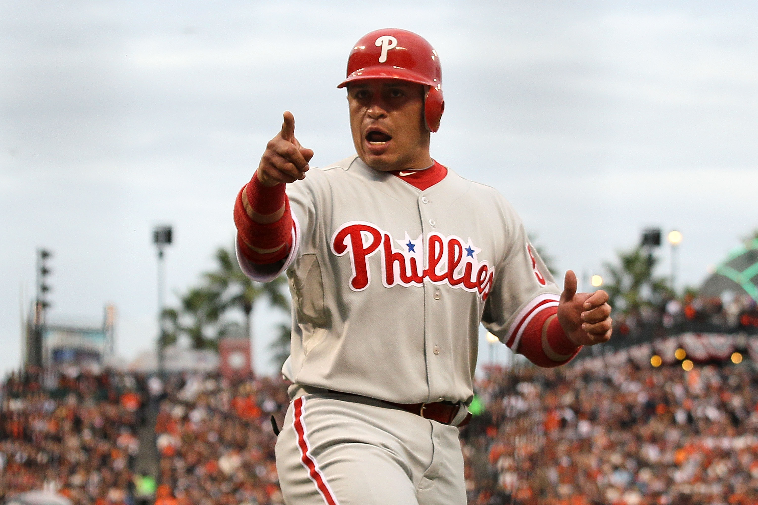 SAN FRANCISCO - OCTOBER 21:  Carlos Ruiz #51 of the Philadelphia Phillies reacts after scoring in the third inning against the San Francisco Giants in Game Five of the NLCS during the 2010 MLB Playoffs at AT&T Park on October 21, 2010 in San Francisco, Ca