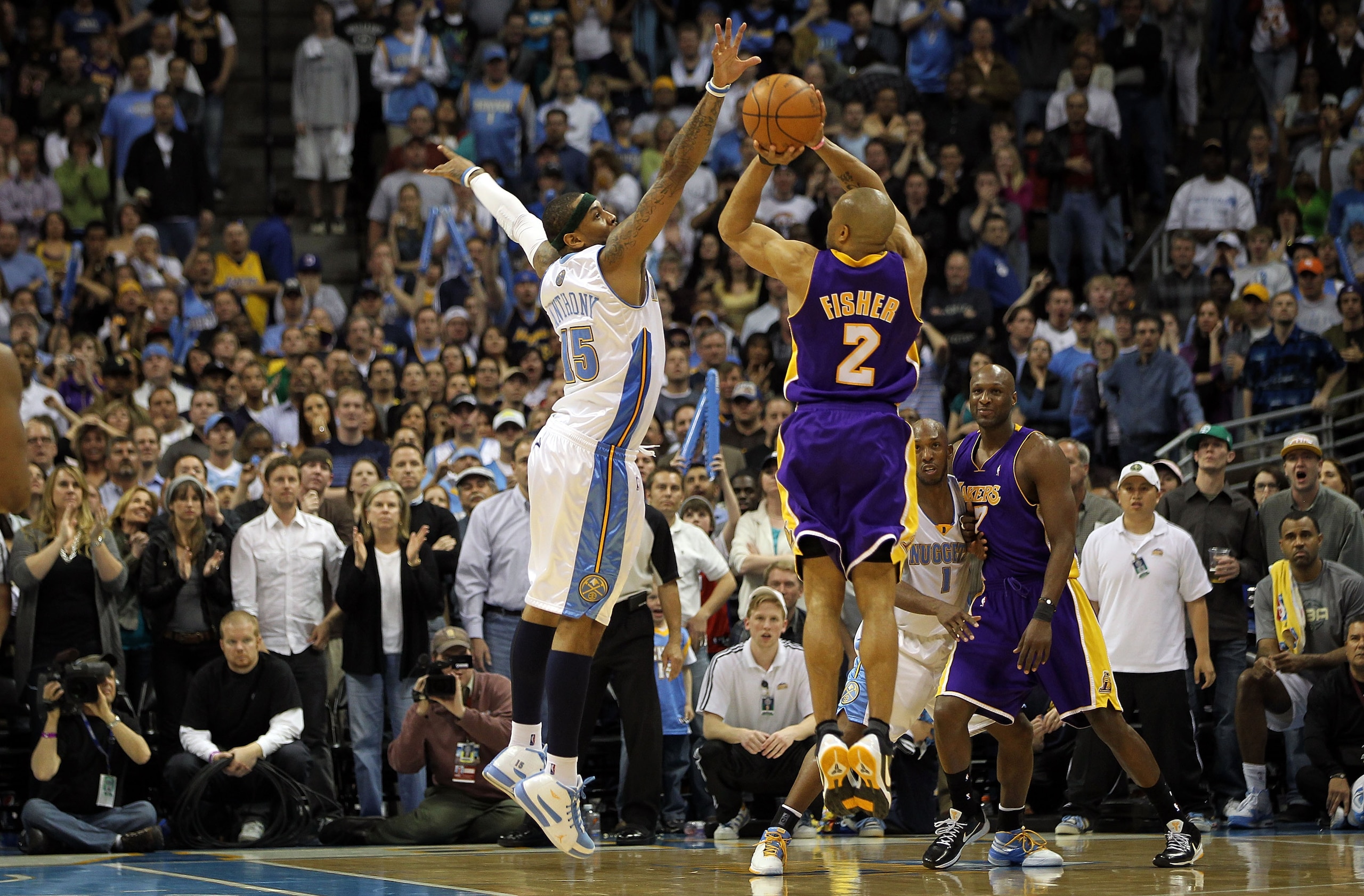 DENVER - APRIL 08:  Derek Fisher #2 of the Los Angeles Lakers takes the final shot of the game over Carmelo Anthony #15 of the Denver Nuggets during NBA action at the Pepsi Center on April 8, 2010 in Denver, Colorado. Fisher missed the shotas the Nuggets