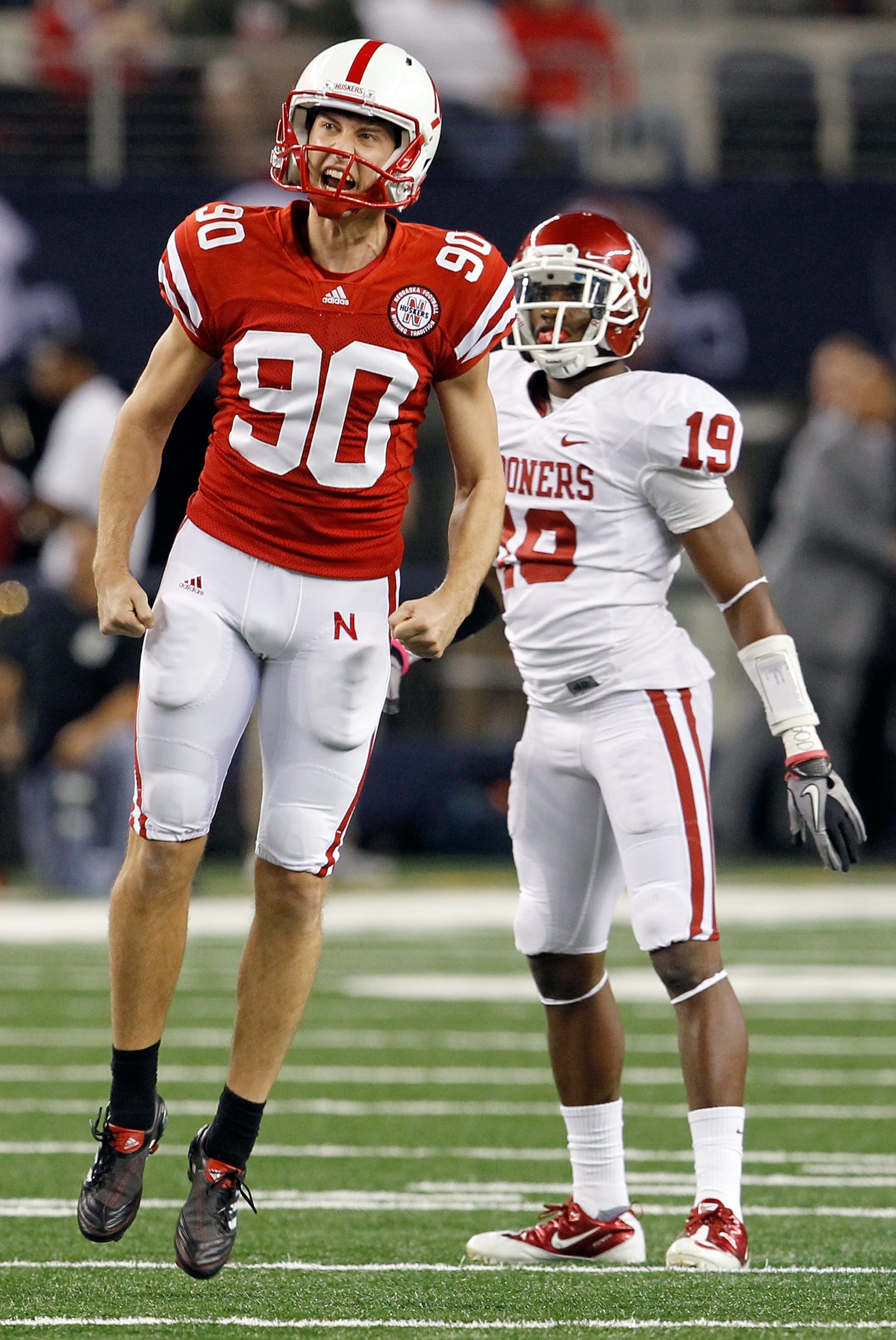 ARLINGTON, TX - DECEMBER 04:  Kicker Alex Henery #90 of the Nebraska Cornhuskers celebrates after kicking a field goal against the Oklahoma Sooners at Cowboys Stadium on December 4, 2010 in Arlington, Texas.  (Photo by Tom Pennington/Getty Images)