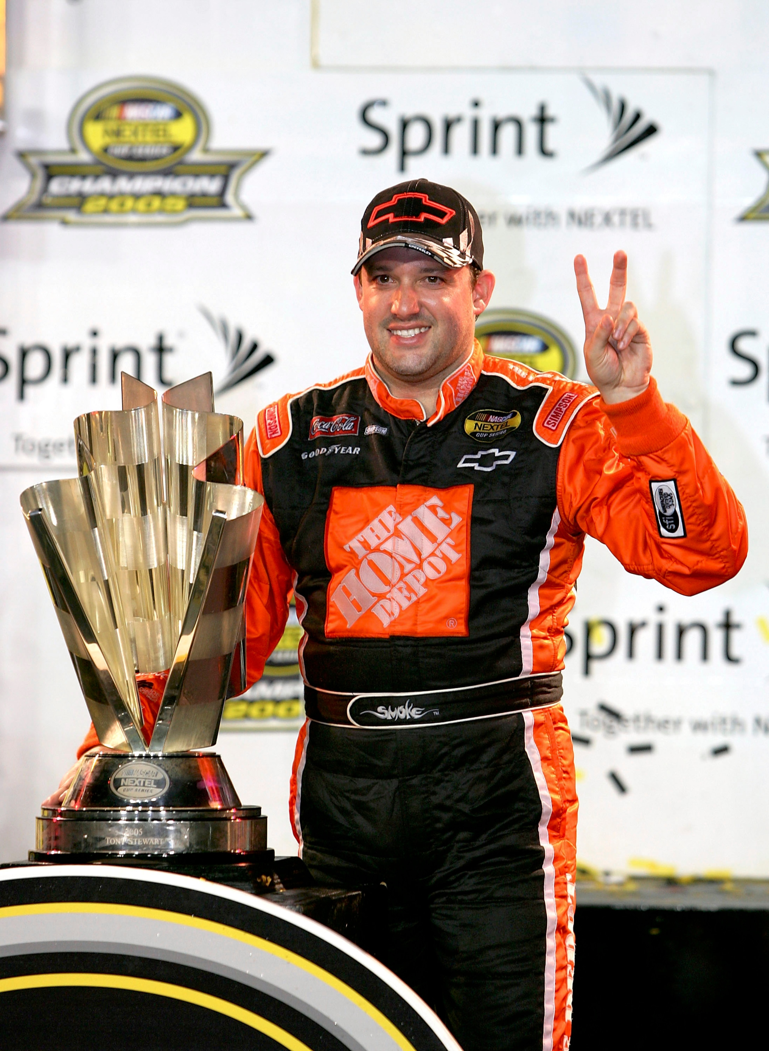 HOMESTEAD, FL - NOVEMBER 20:  Tony Stewart, driver of the #20 Home Depot Chevrolet, celebrates winning the NASCAR Nextel Cup Championship after the Ford 400 on November 20, 2005 at Homestead-Miami Speedway in Homestead, Florida.  (Photo By Streeter Lecka/