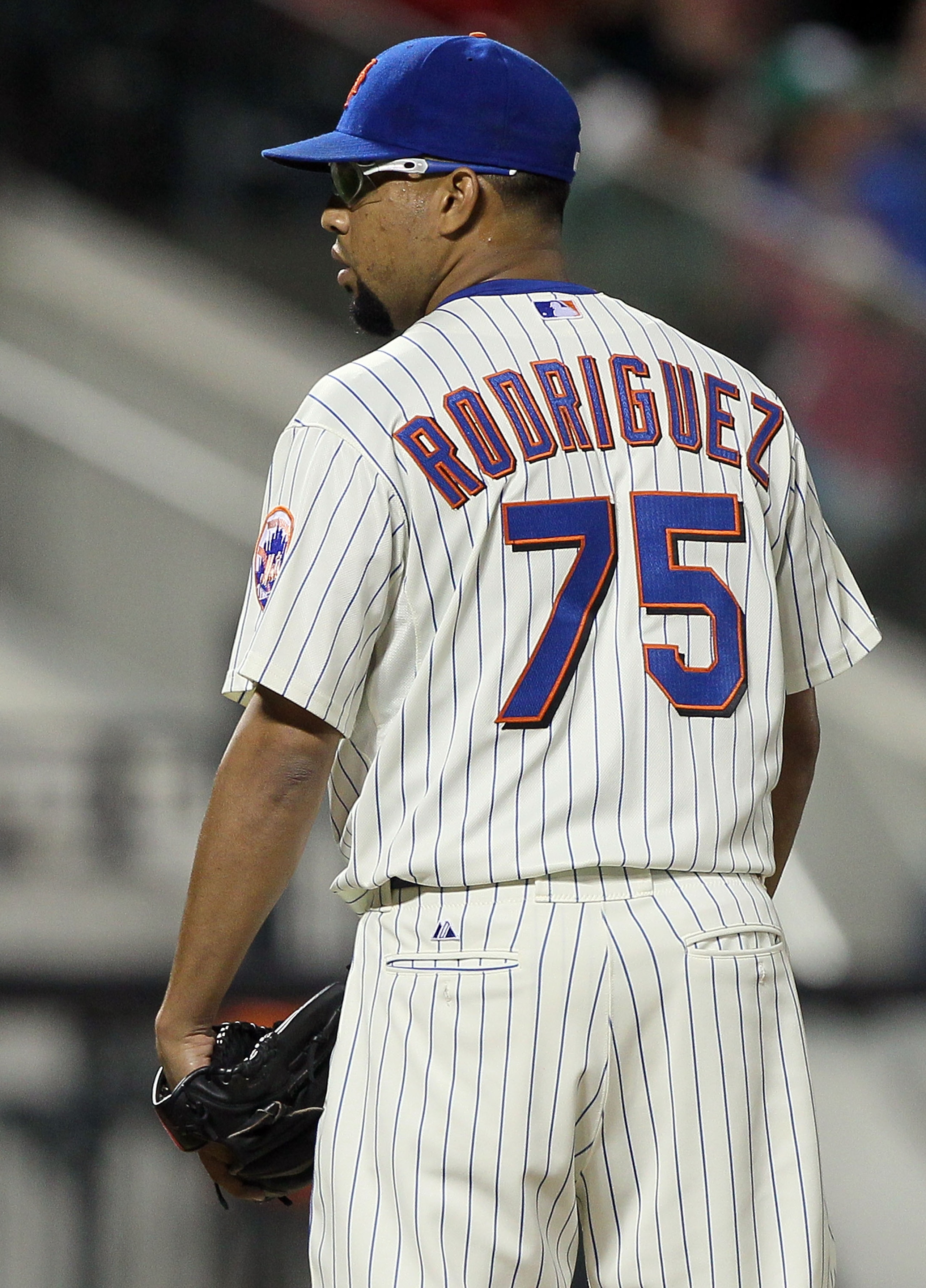 NEW YORK - AUGUST 14: Francisco Rodriguez #75 of the New York Mets looks on after pitching in the ninth inning against the Philadelphia Phillies on August 14, 2010 at Citi Field in the Flushing neighborhood of the Queens borough of New York City. The Phi NEW YORK - AUGUST 14: Francisco Rodriguez #75 of the New York Mets looks on after pitching in the ninth inning against the Philadelphia Phillies on August 14, 2010 at Citi Field in the Flushing neighborhood of the Queens borough of New York City. The Phi