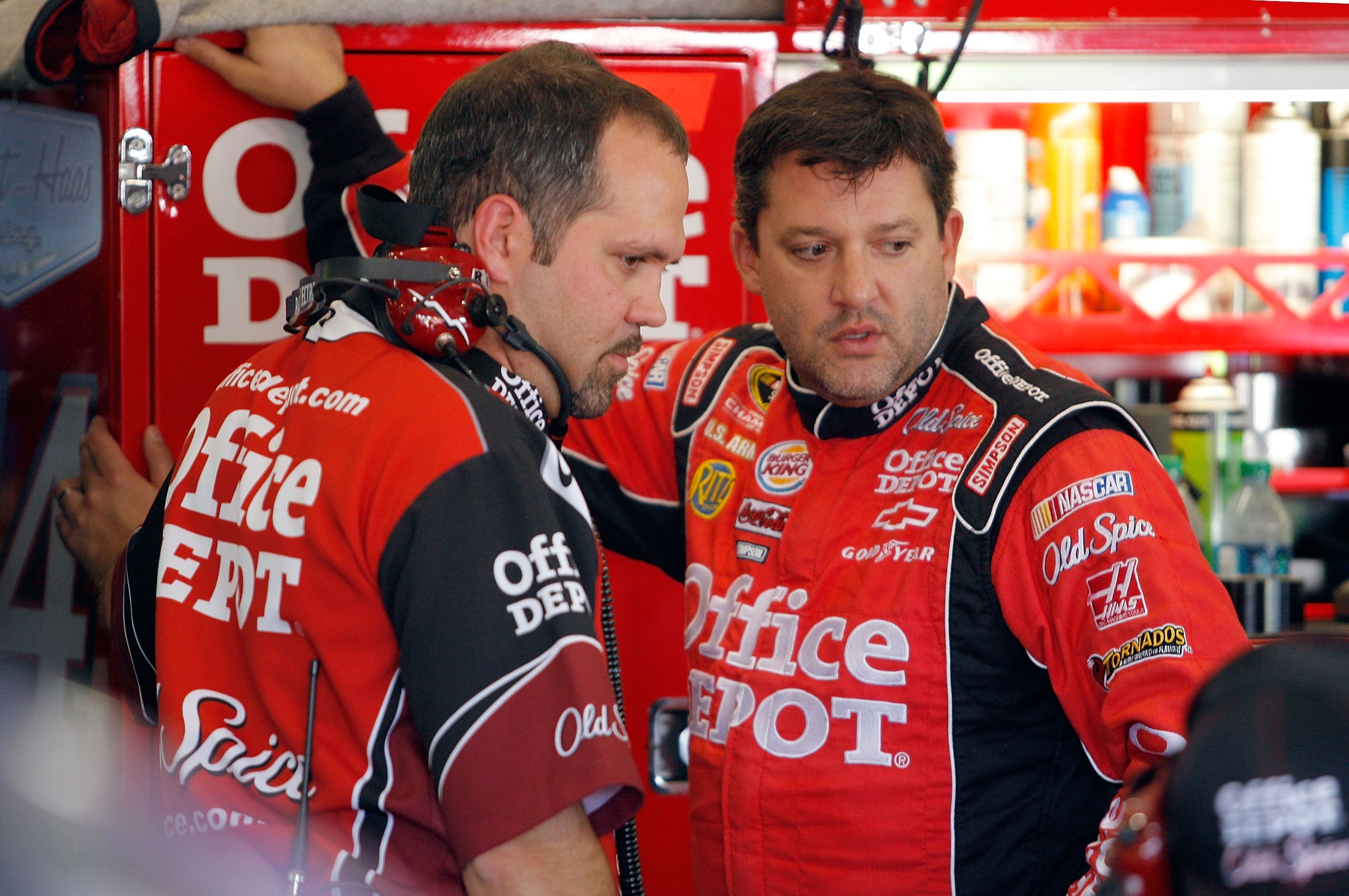 FONTANA, CA - OCTOBER 08:  (R-L) Tony Stewart, driver of the #14 Office Depot Chevrolet, speaks Darian Grubb during practice for the NASCAR Sprint Cup Series Pepsi Max 400 on October 8, 2010 in Fontana, California.  (Photo by Tom Pennington/Getty Images f