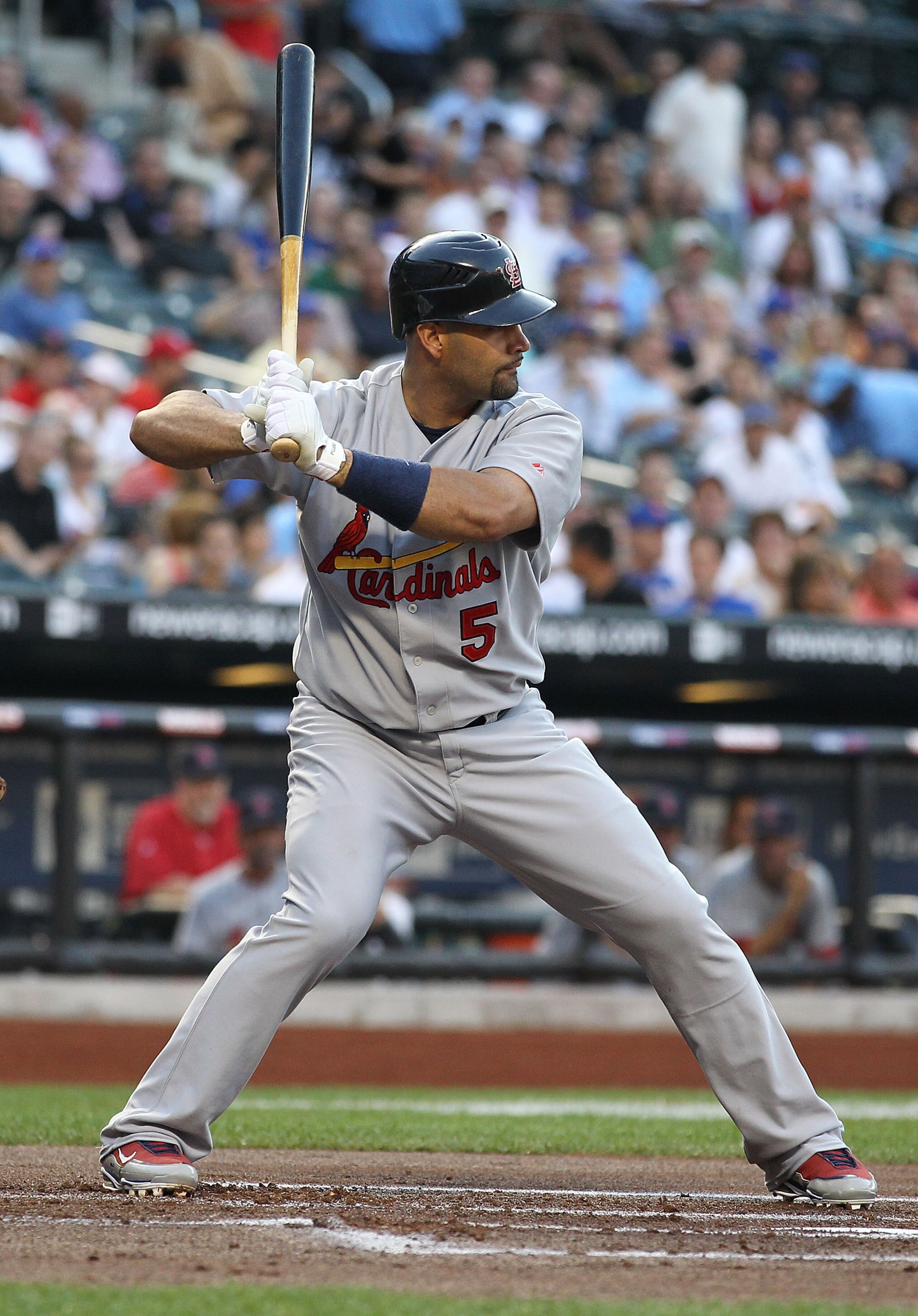 NEW YORK - JULY 27:  Albert Pujols #5 of the St. Louis Cardinals flies out against the New York Mets during their game on July 27, 2010 at Citi Field in the Flushing neighborhood of the Queens borough of New York City.  (Photo by Al Bello/Getty Images)