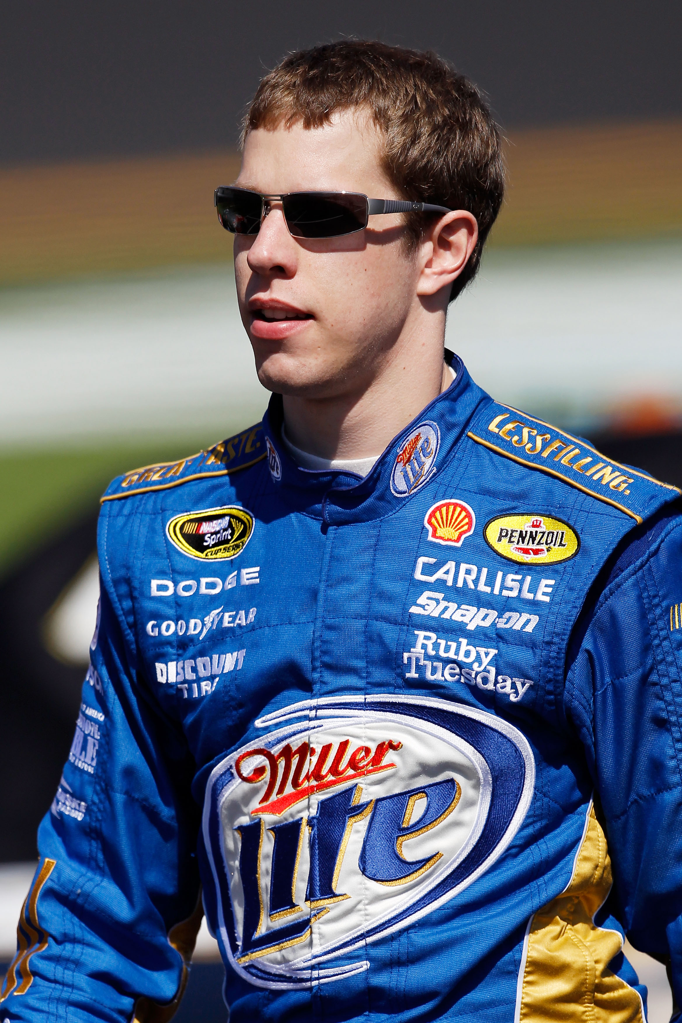 DAYTONA BEACH, FL - FEBRUARY 13:  Brad Keselowski, driver of the #2 Miller Lite Dodge, looks on during qualifying for the NASCAR Sprint Cup Series Daytona 500 at Daytona International Speedway on February 13, 2011 in Daytona Beach, Florida.  (Photo by Tom