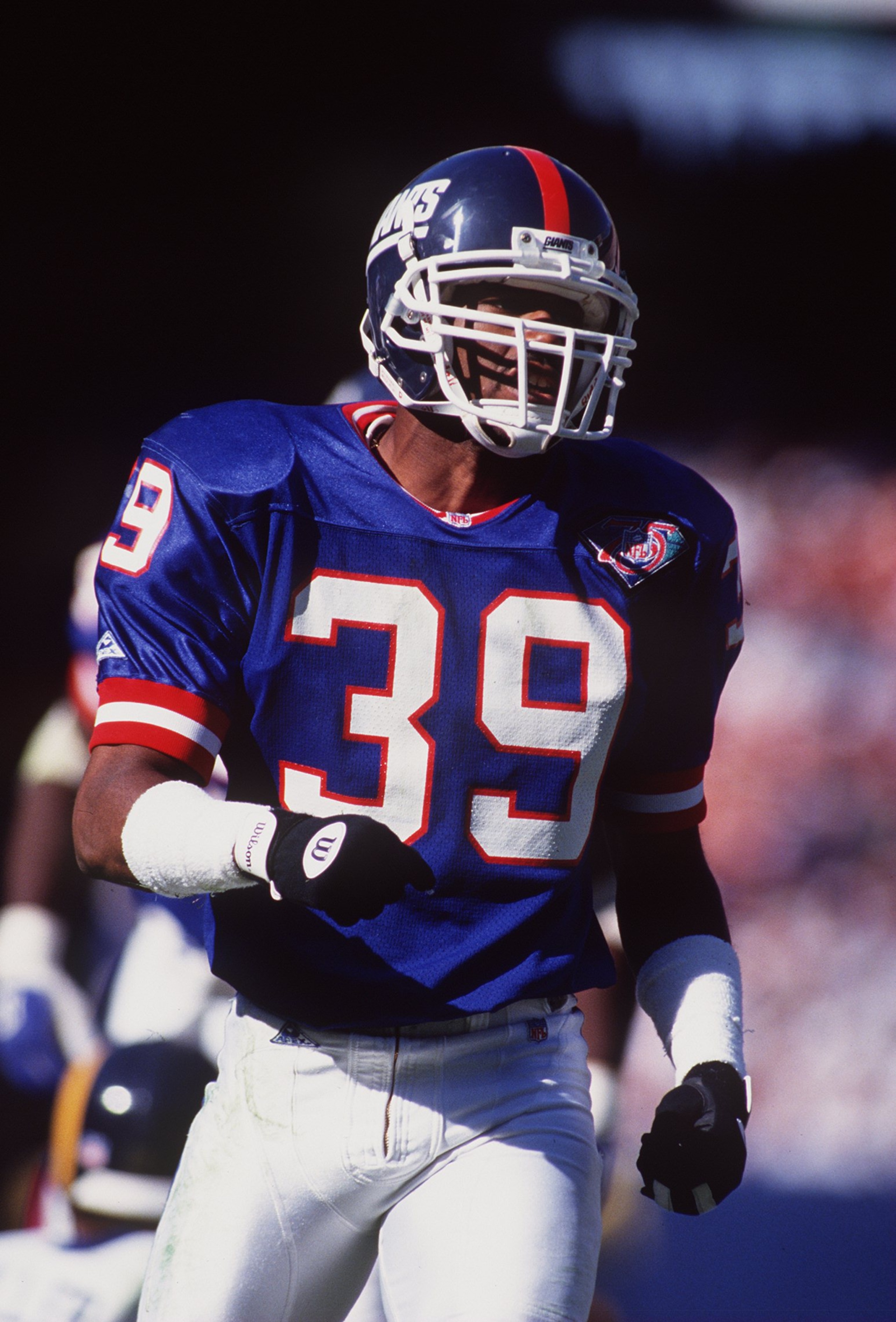 16 OCT 1994: COREY RAYMOND, DEFENSIVE BACK FOR THE NEW YORK GIANTS, DURING THEIR 17-10 LOSS TO THE LOS ANGELES RAMS AT ANAHEIM STADIUM IN ANAHEIM, CALIFORNIA. Mandatory Credit: Al Bello/ALLSPORT 16 OCT 1994: COREY RAYMOND, DEFENSIVE BACK FOR THE NEW YORK GIANTS, DURING THEIR 17-10 LOSS TO THE LOS ANGELES RAMS AT ANAHEIM STADIUM IN ANAHEIM, CALIFORNIA. Mandatory Credit: Al Bello/ALLSPORT