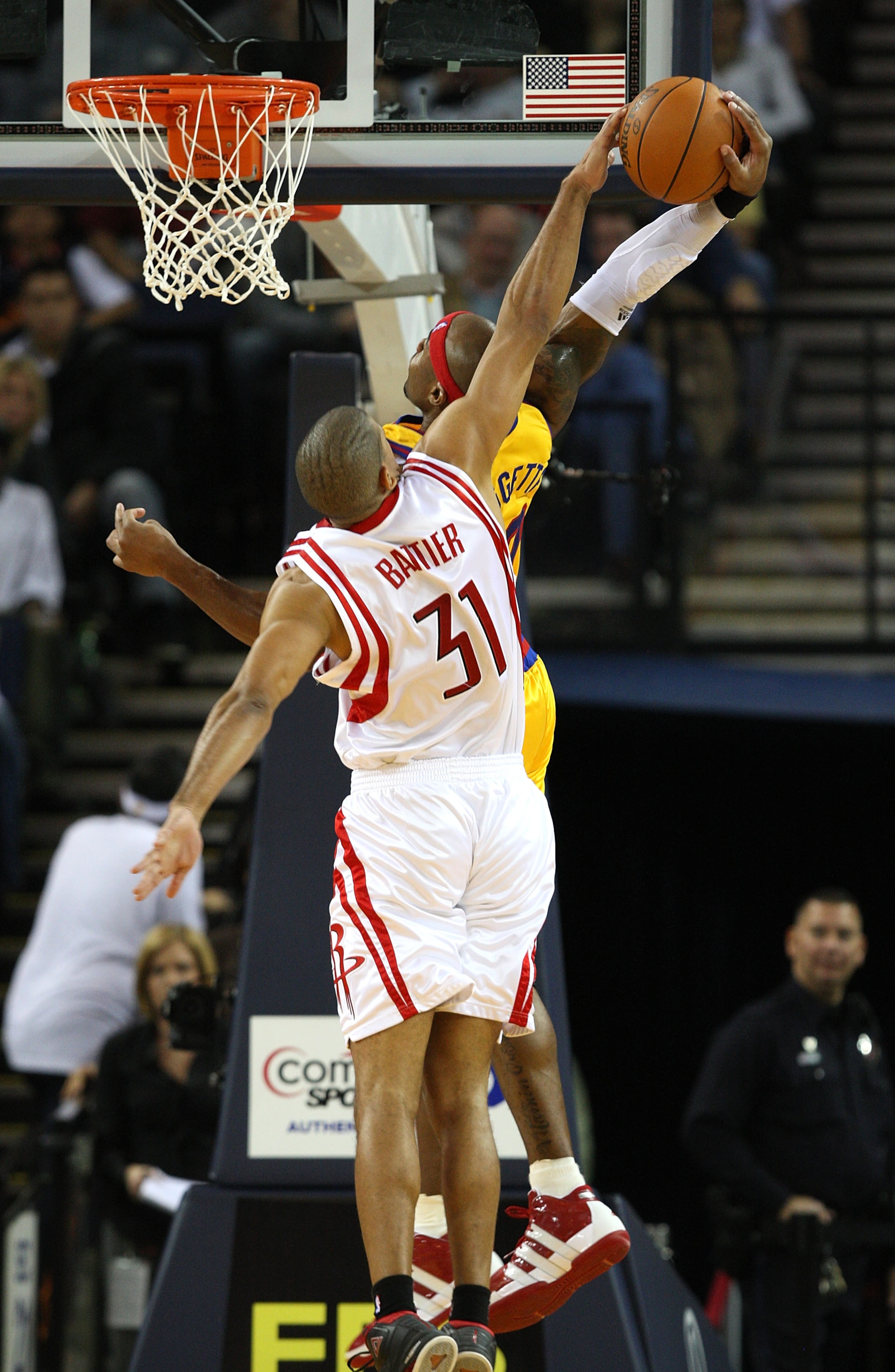 OAKLAND, CA - DECEMBER 03:  Corey Maggette #50 of the Golden State Warriors has his shot blocked by Shane Battier #31 of the Houston Rockets during an NBA game at Oracle Arena on December 3, 2009 in Oakland, California. NOTE TO USER: User expressly acknow