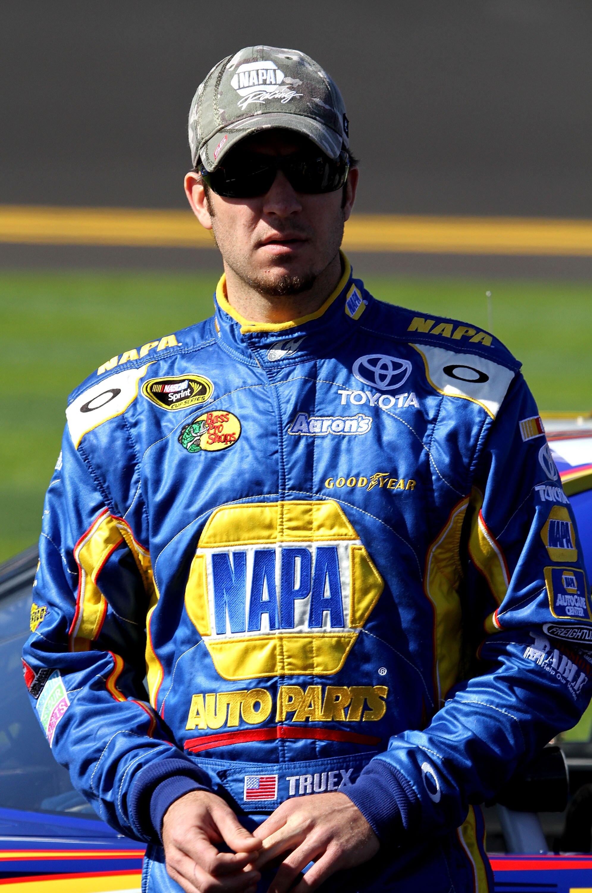DAYTONA BEACH, FL - FEBRUARY 13:  Martin Truex Jr., driver of the #56 NAPA Toyota, looks on during qualifying for the NASCAR Sprint Cup Series Daytona 500 at Daytona International Speedway on February 13, 2011 in Daytona Beach, Florida.  (Photo by Jerry M