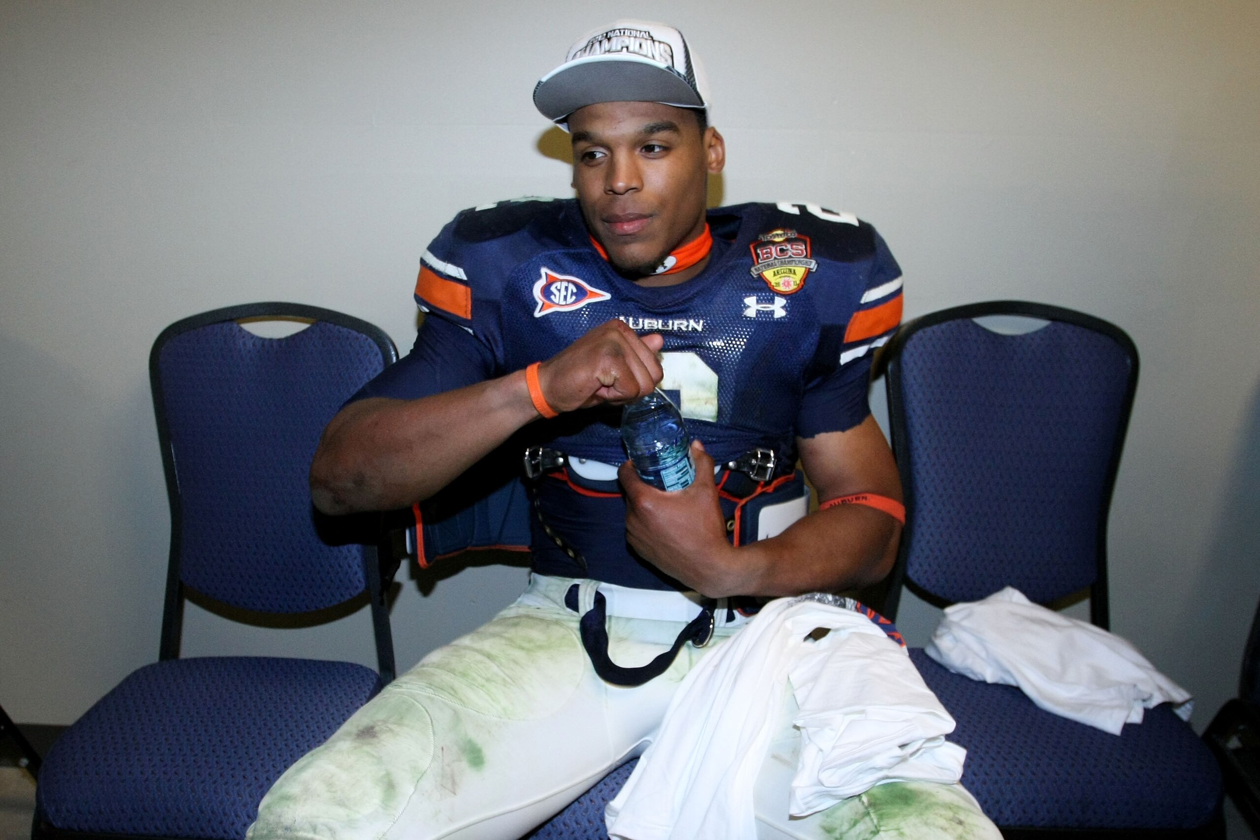 GLENDALE, AZ - JANUARY 10: Quarterback Cameron Newton #2 of the Auburn Tigers drinks water in the hallway minutes after the Tigers 22-19 victory against the Oregon Ducks in the Tostitos BCS National Championship Game at University of Phoenix Stadium on Ja