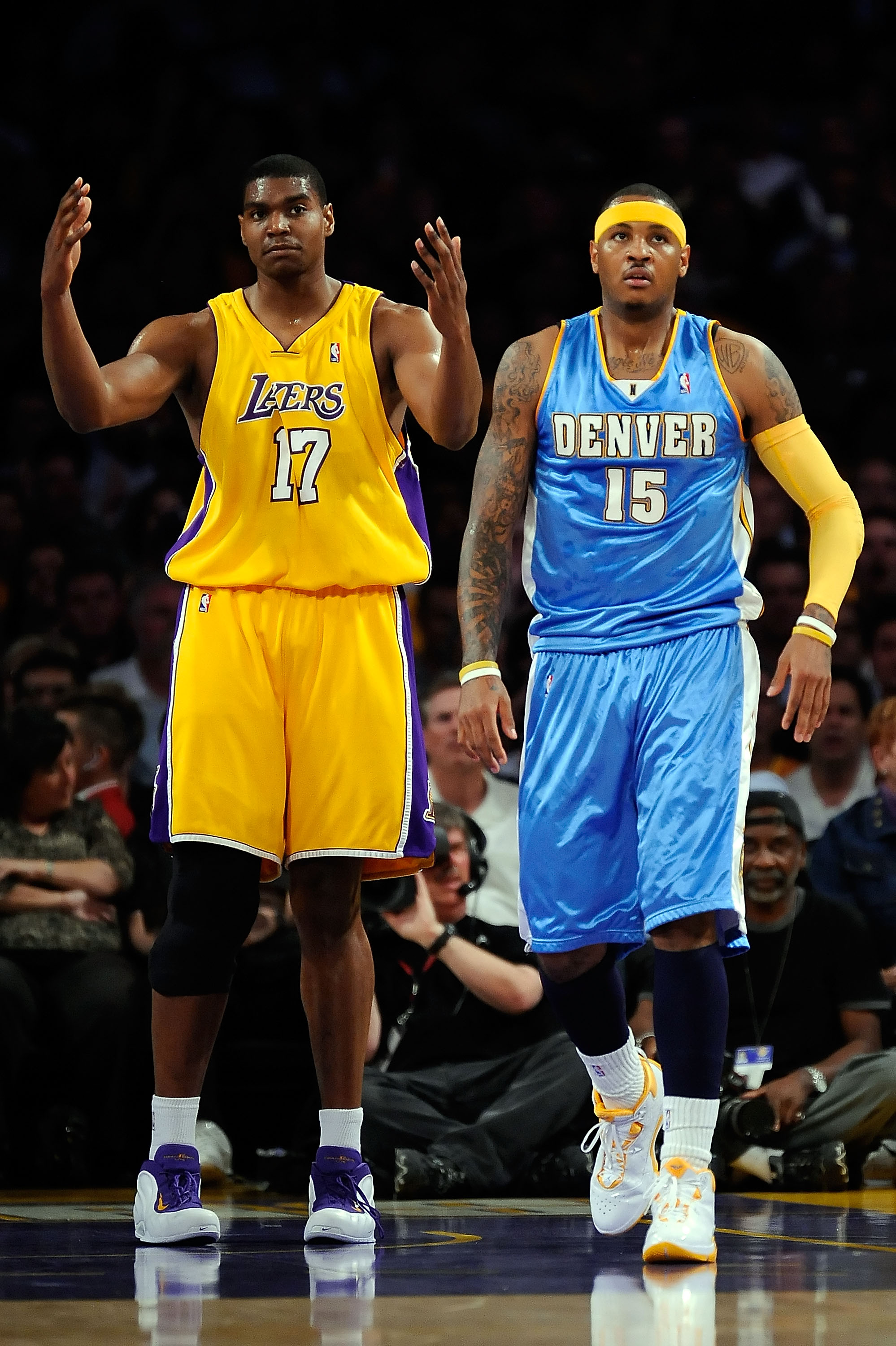LOS ANGELES, CA - MAY 27:  Andrew Bynum #17 of the Los Angeles Lakers reacts next to Carmelo Anthony #15 of the Denver Nuggets in the first half of Game Five of the Western Conference Finals during the 2009 NBA Playoffs at Staples Center on May 27, 2009 i