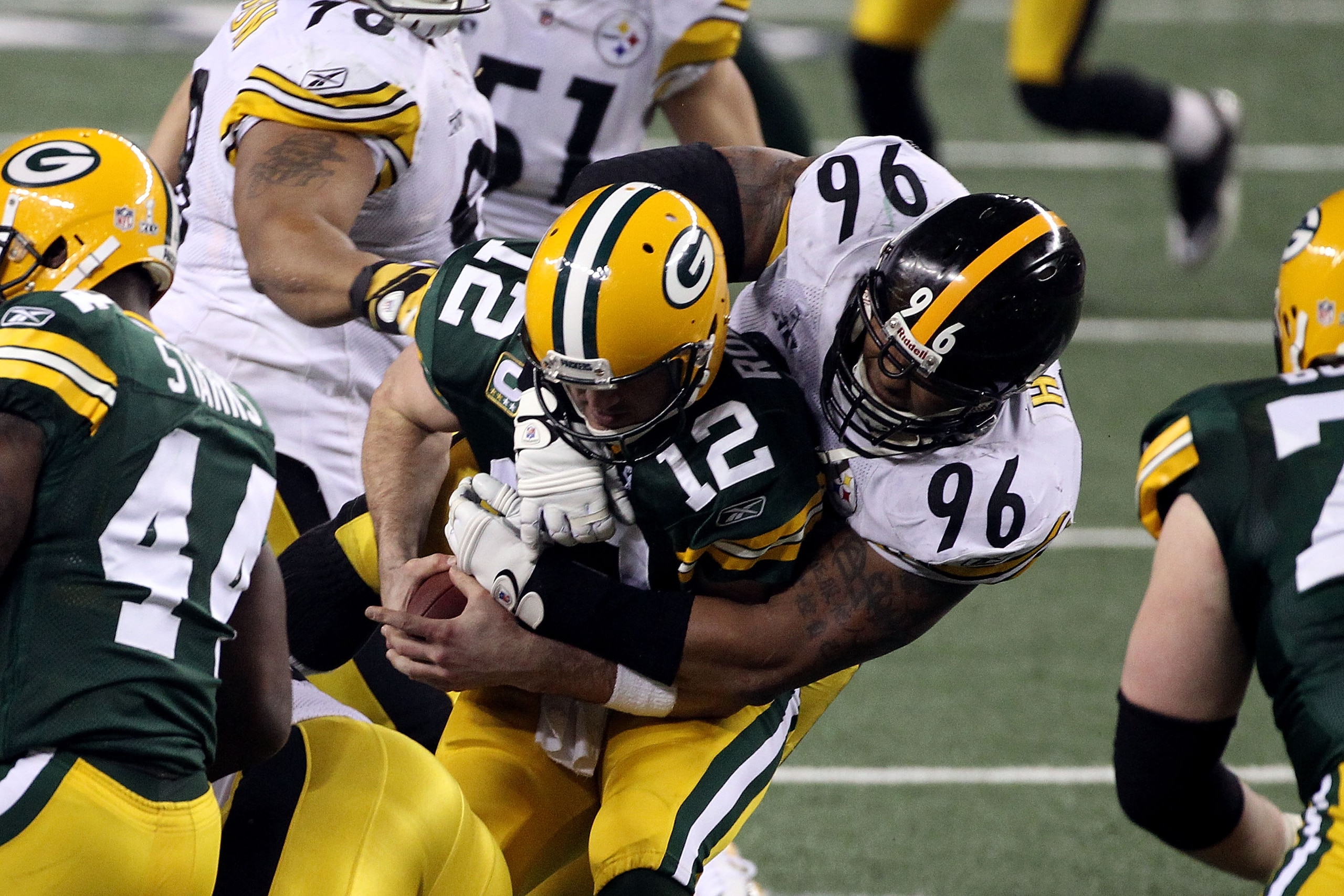 ARLINGTON, TX - FEBRUARY 06:  Ziggy Hood #96 of the Pittsburgh Steelers sacks Aaron Rodgers #12 of the Green Bay Packers during Super Bowl XLV at Cowboys Stadium on February 6, 2011 in Arlington, Texas.  (Photo by Streeter Lecka/Getty Images)