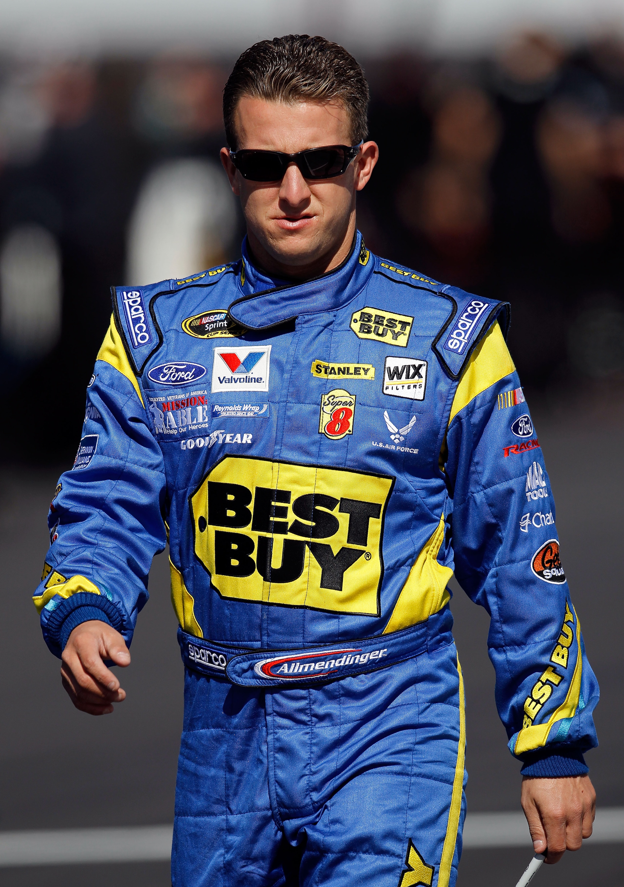 DAYTONA BEACH, FL - FEBRUARY 13: A.J. Allmendinger, driver of the #43 Best Buy Ford, walks on the grid during qualifying for the NASCAR Sprint Cup Series Daytona 500 at Daytona International Speedway on February 13, 2011 in Daytona Beach, Florida. (Phot DAYTONA BEACH, FL - FEBRUARY 13: A.J. Allmendinger, driver of the #43 Best Buy Ford, walks on the grid during qualifying for the NASCAR Sprint Cup Series Daytona 500 at Daytona International Speedway on February 13, 2011 in Daytona Beach, Florida. (Phot