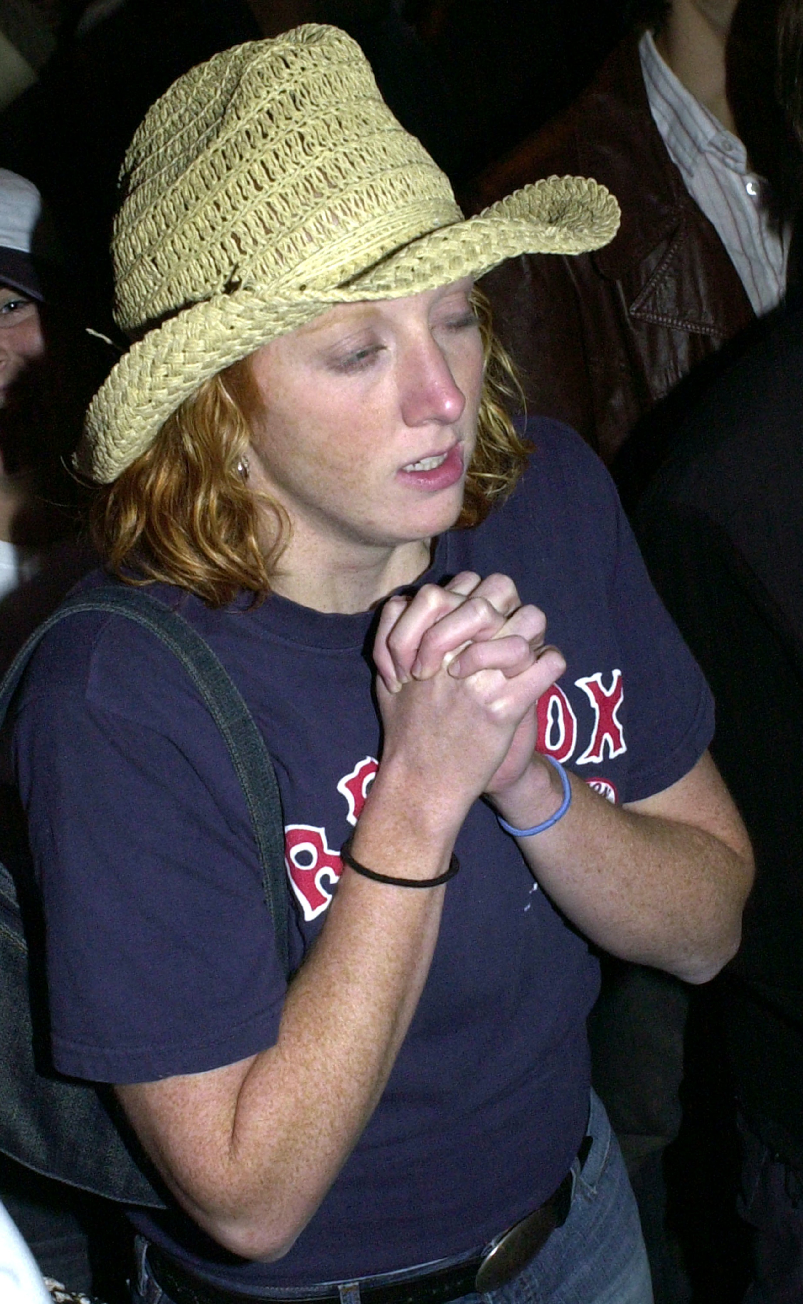 BOSTON - OCTOBER 16:  A Boston Red Sox fan holds out hope during extra innings of game 7 of the American League Championship Series between the Red Sox and the New York Yankees October 16 , 2003 in Boston, Massachusetts. The New York Yankees defeated the