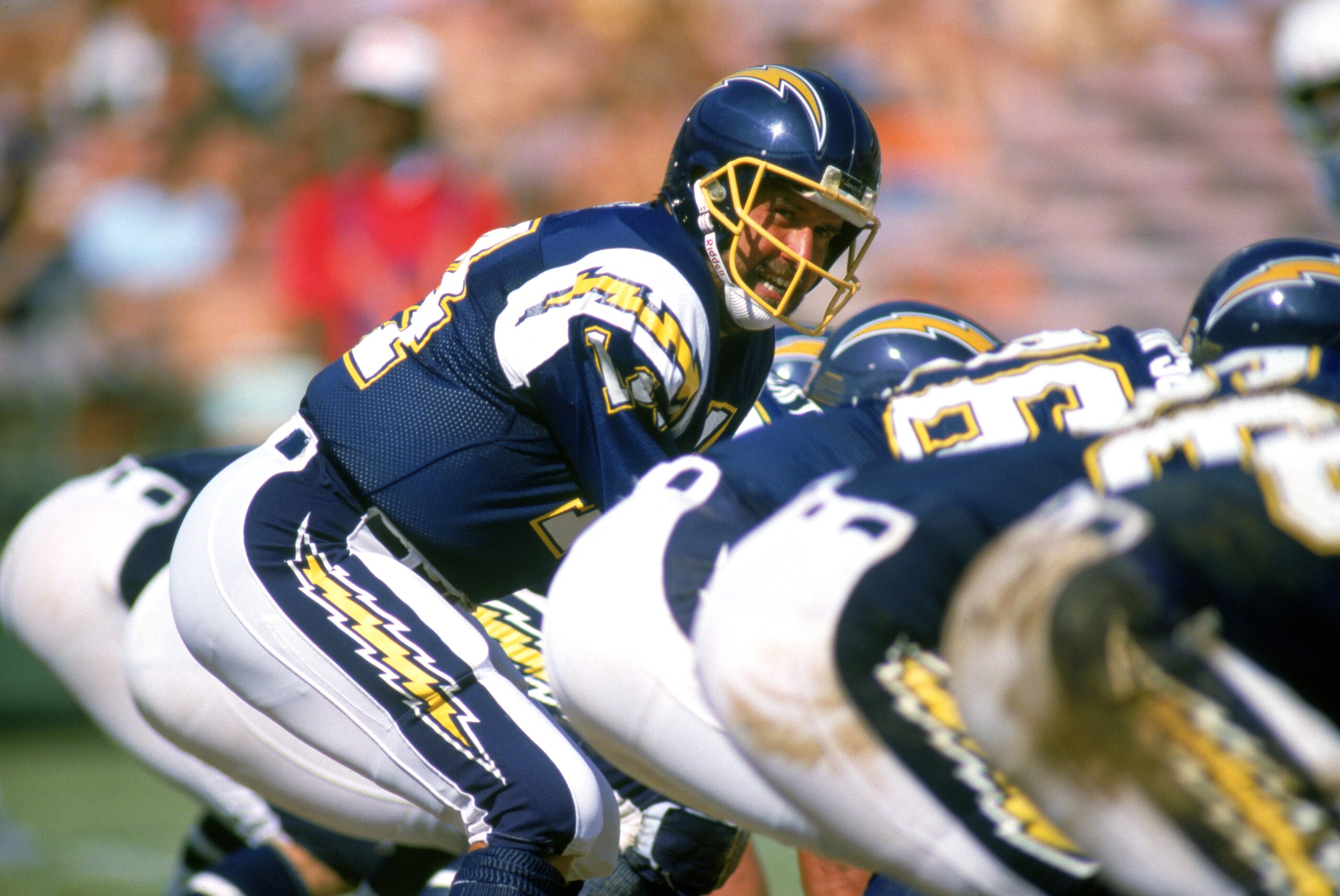 SAN DIEGO -1987: Dan Fouts #14 of the San Diego Chargers calls the audible during a 1987 NFL season game at Jack Murphy Stadium in San Diego, California. ( Photo by: Stephen Dunn/Getty Images)