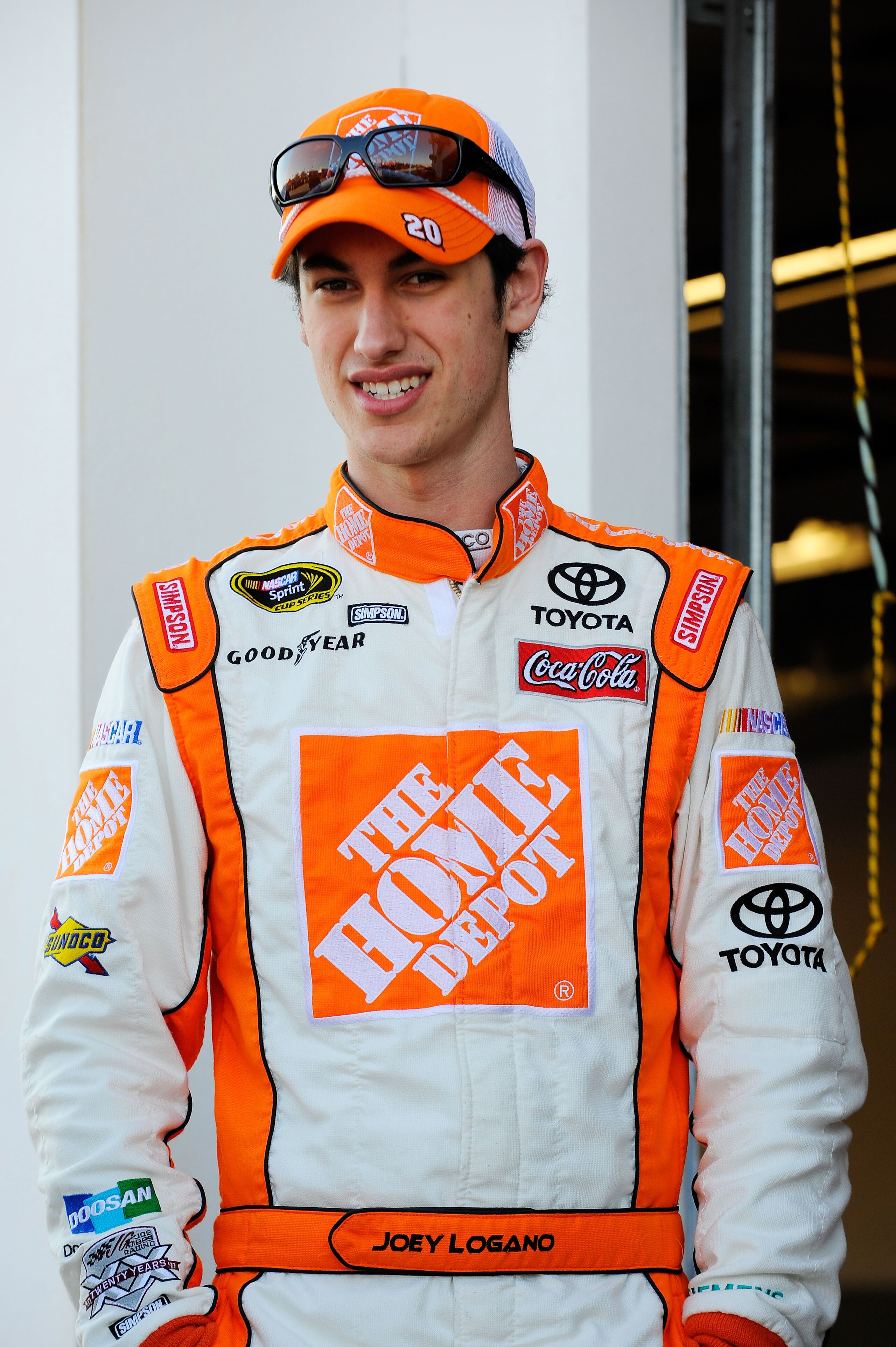DAYTONA BEACH, FL - FEBRUARY 11: Joey Logano, driver of the #20 Home Depot Toyota, stands in the garage area during practice for the NASCAR Budweiser Shootout at Daytona International Speedway on February 11, 2011 in Daytona Beach, Florida. (Photo by Ja DAYTONA BEACH, FL - FEBRUARY 11: Joey Logano, driver of the #20 Home Depot Toyota, stands in the garage area during practice for the NASCAR Budweiser Shootout at Daytona International Speedway on February 11, 2011 in Daytona Beach, Florida. (Photo by Ja