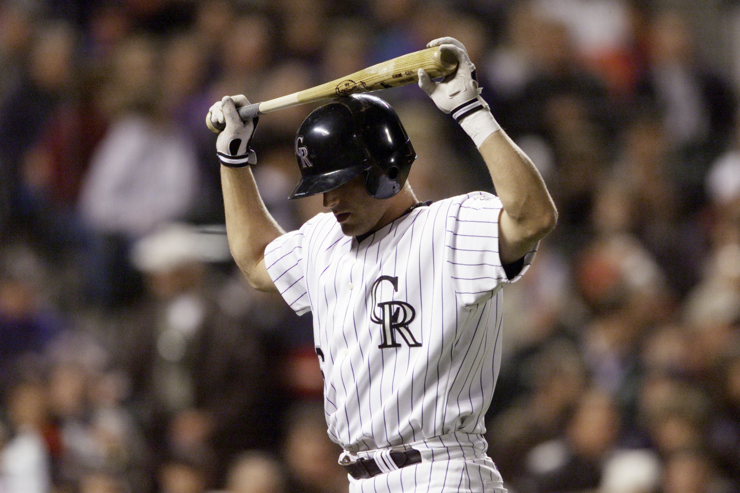 13 Apr 2001:  Ben Petrick #6 of the Colorado Rockies holds his bat on his head after striking out against pitcher Randy Johnson of the Arizona Diamondbacks at Coors Field in Denver, Colorado.  <DIGITAL IMAGE> Mandatory Credit: Brian Bahr/ALLSPORT