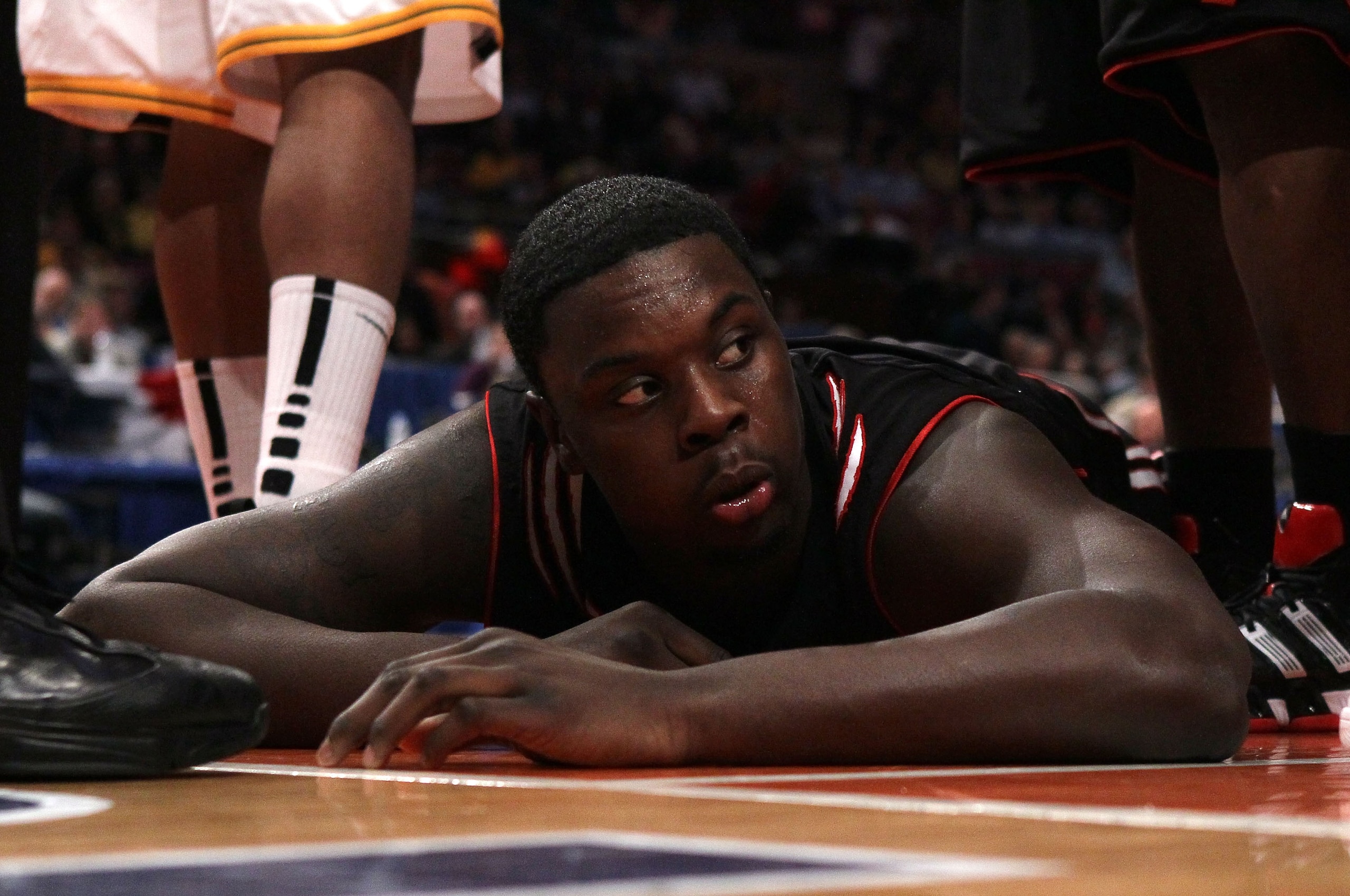 NEW YORK - MARCH 11: Lance Stephenson #33 of the Cincinnati Bearcats lays on the court after a play late in the game against the West Virginia Mountaineers during the quarterfinal of the 2010 NCAA Big East Tournament at Madison Square Garden on March 11, NEW YORK - MARCH 11: Lance Stephenson #33 of the Cincinnati Bearcats lays on the court after a play late in the game against the West Virginia Mountaineers during the quarterfinal of the 2010 NCAA Big East Tournament at Madison Square Garden on March 11,
