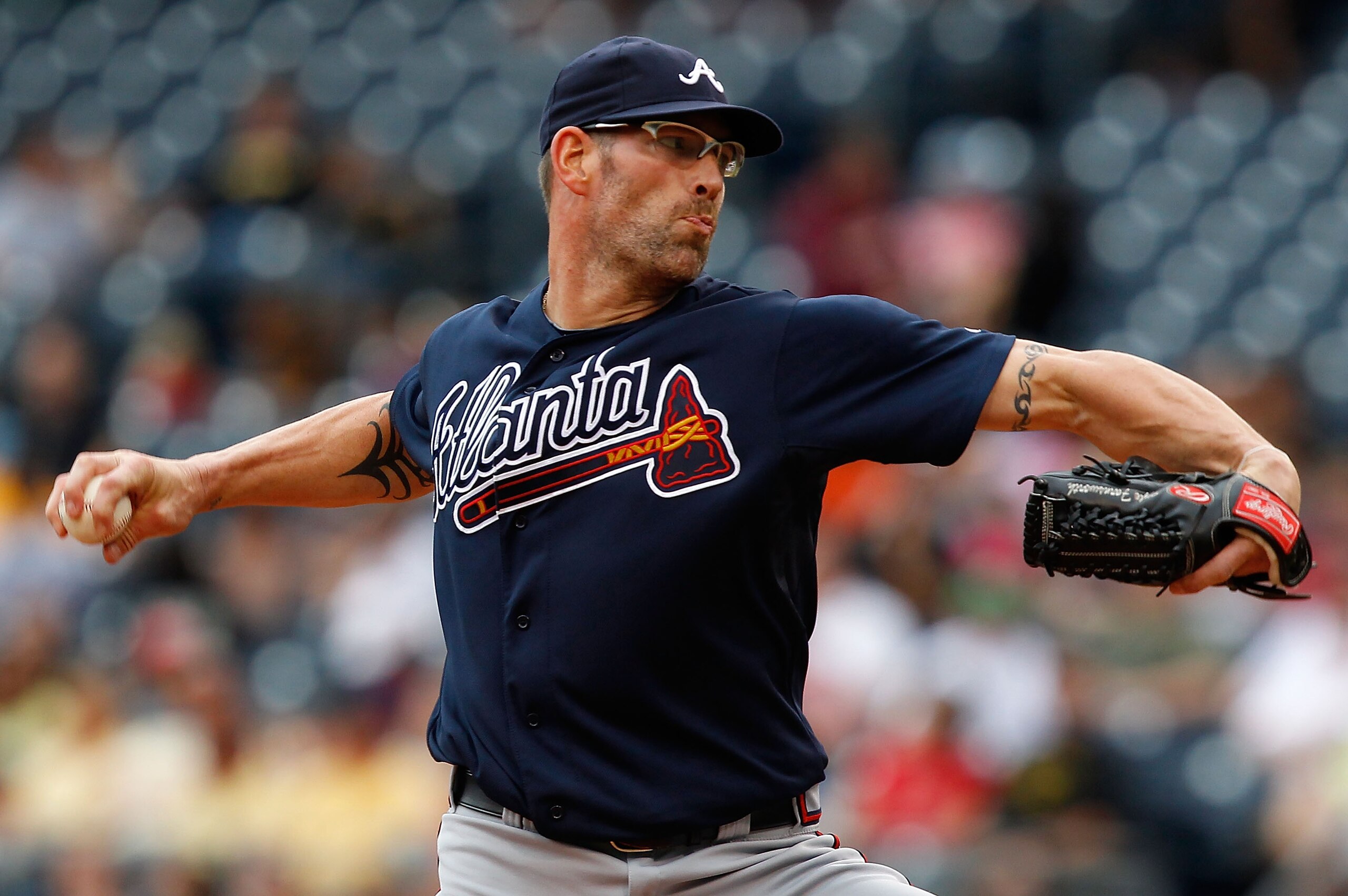 PITTSBURGH - SEPTEMBER 06: Kyle Farnsworth #43 of the Atlanta Braves pitches against the Pittsburgh Pirates during the game on September 6, 2010 at PNC Park in Pittsburgh, Pennsylvania. The Pirates beat the Braves 3-1. (Photo by Jared Wickerham/Getty Im PITTSBURGH - SEPTEMBER 06: Kyle Farnsworth #43 of the Atlanta Braves pitches against the Pittsburgh Pirates during the game on September 6, 2010 at PNC Park in Pittsburgh, Pennsylvania. The Pirates beat the Braves 3-1. (Photo by Jared Wickerham/Getty Im