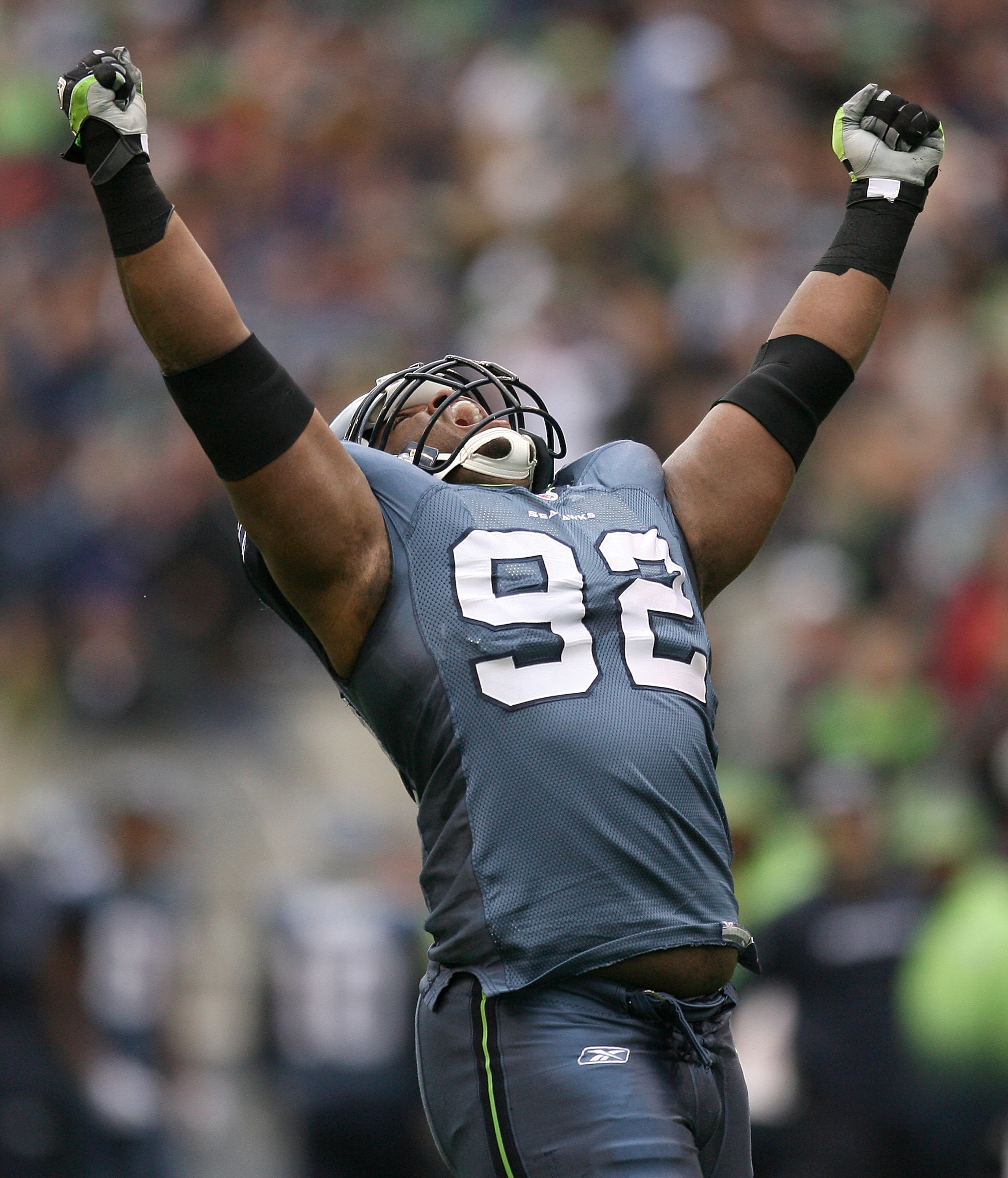 SEATTLE - NOVEMBER 08:  Defensive tackle Brandon Mebane #92 of the Seattle Seahawks celebrates after sacking the quarterback against the Detroit Lions on November 8, 2009 at Qwest Field in Seattle, Washington. The Seahawks defeated the Lions 32-20. (Photo