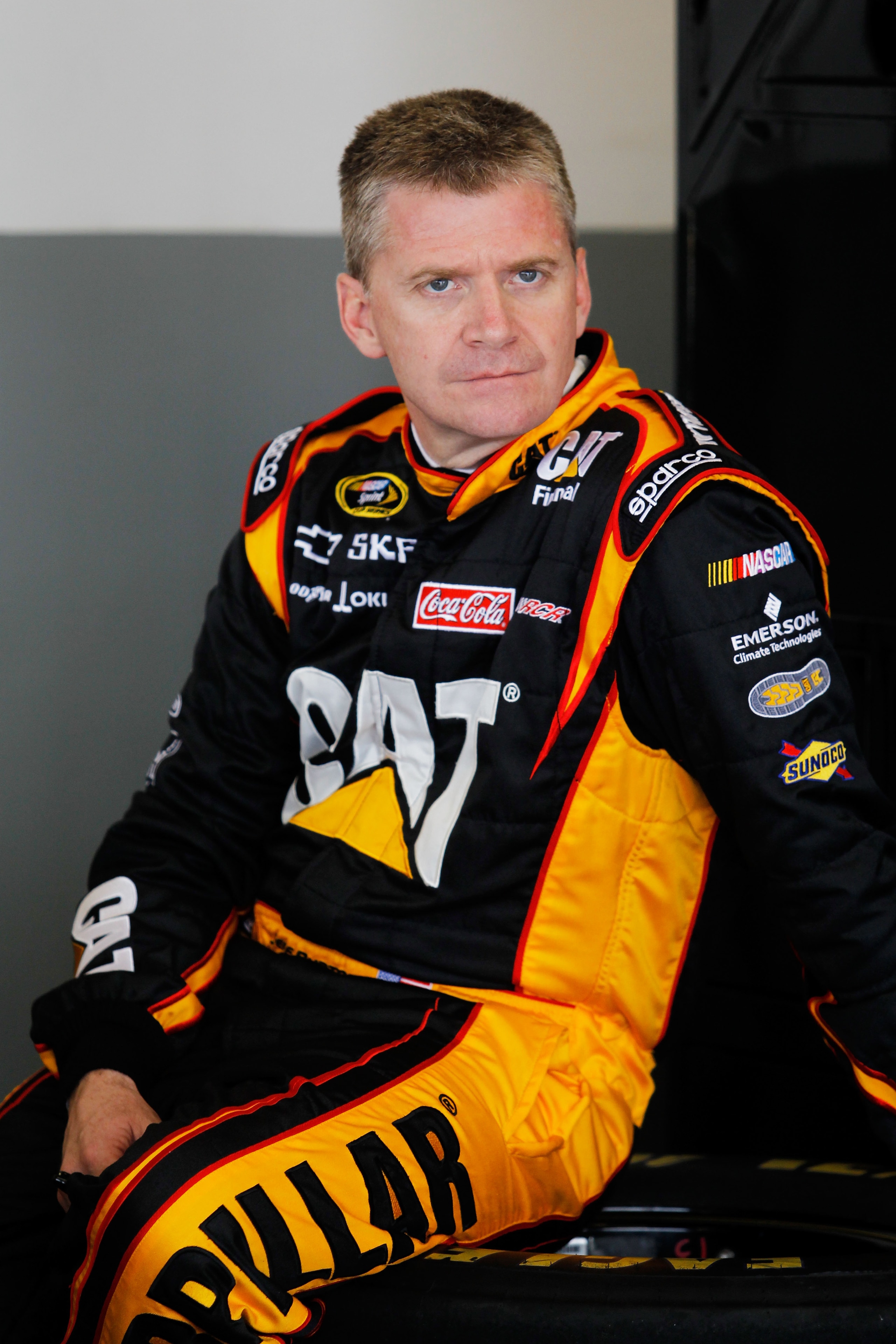 DAYTONA BEACH, FL - FEBRUARY 16: Jeff Burton, driver of the #31 Caterpilliar Chevrolet, looks on in the garage area during practice for the NASCAR Sprint Cup Series Daytona 500 at Daytona International Speedway on February 16, 2011 in Daytona Beach, Flor DAYTONA BEACH, FL - FEBRUARY 16: Jeff Burton, driver of the #31 Caterpilliar Chevrolet, looks on in the garage area during practice for the NASCAR Sprint Cup Series Daytona 500 at Daytona International Speedway on February 16, 2011 in Daytona Beach, Flor