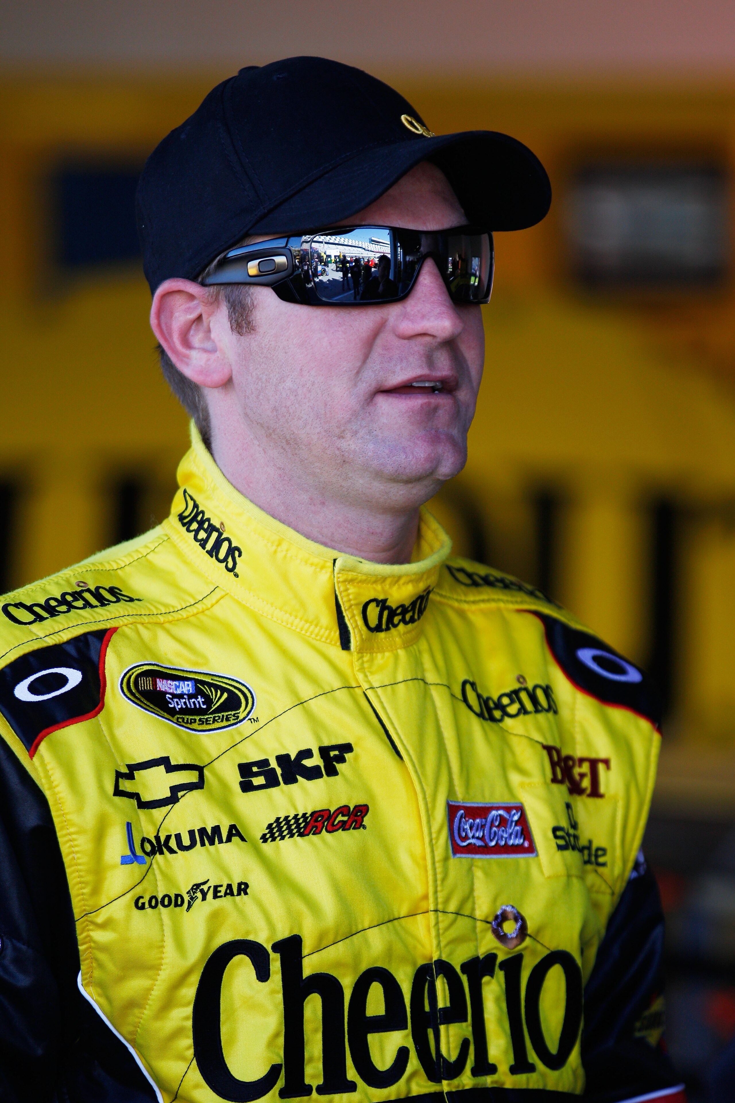 DAYTONA BEACH, FL - FEBRUARY 12: Clint Bowyer, driver of the #33 Cheerios Chevrolet, stands in the garage area during practice for the NASCAR Sprint Cup Series Daytona 500 at Daytona International Speedway on February 12, 2011 in Daytona Beach, Florida. DAYTONA BEACH, FL - FEBRUARY 12: Clint Bowyer, driver of the #33 Cheerios Chevrolet, stands in the garage area during practice for the NASCAR Sprint Cup Series Daytona 500 at Daytona International Speedway on February 12, 2011 in Daytona Beach, Florida.