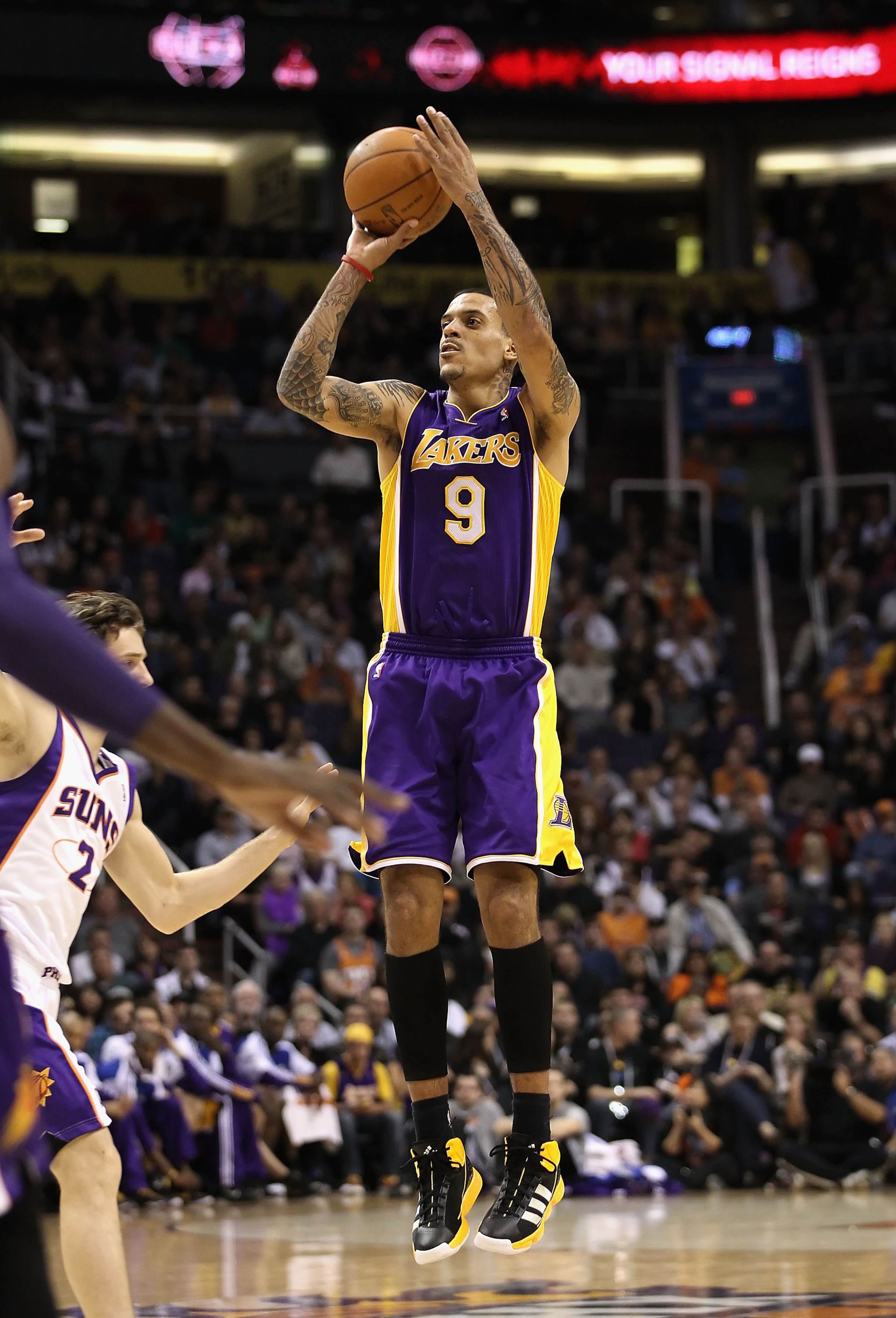 PHOENIX, AZ - JANUARY 05:  Matt Barnes #9 of the Los Angeles Lakers puts up a shot against the Phoenix Suns during the NBA game at US Airways Center on January 5, 2011 in Phoenix, Arizona. The Lakers defeated the Suns 99-95.  NOTE TO USER: User expressly