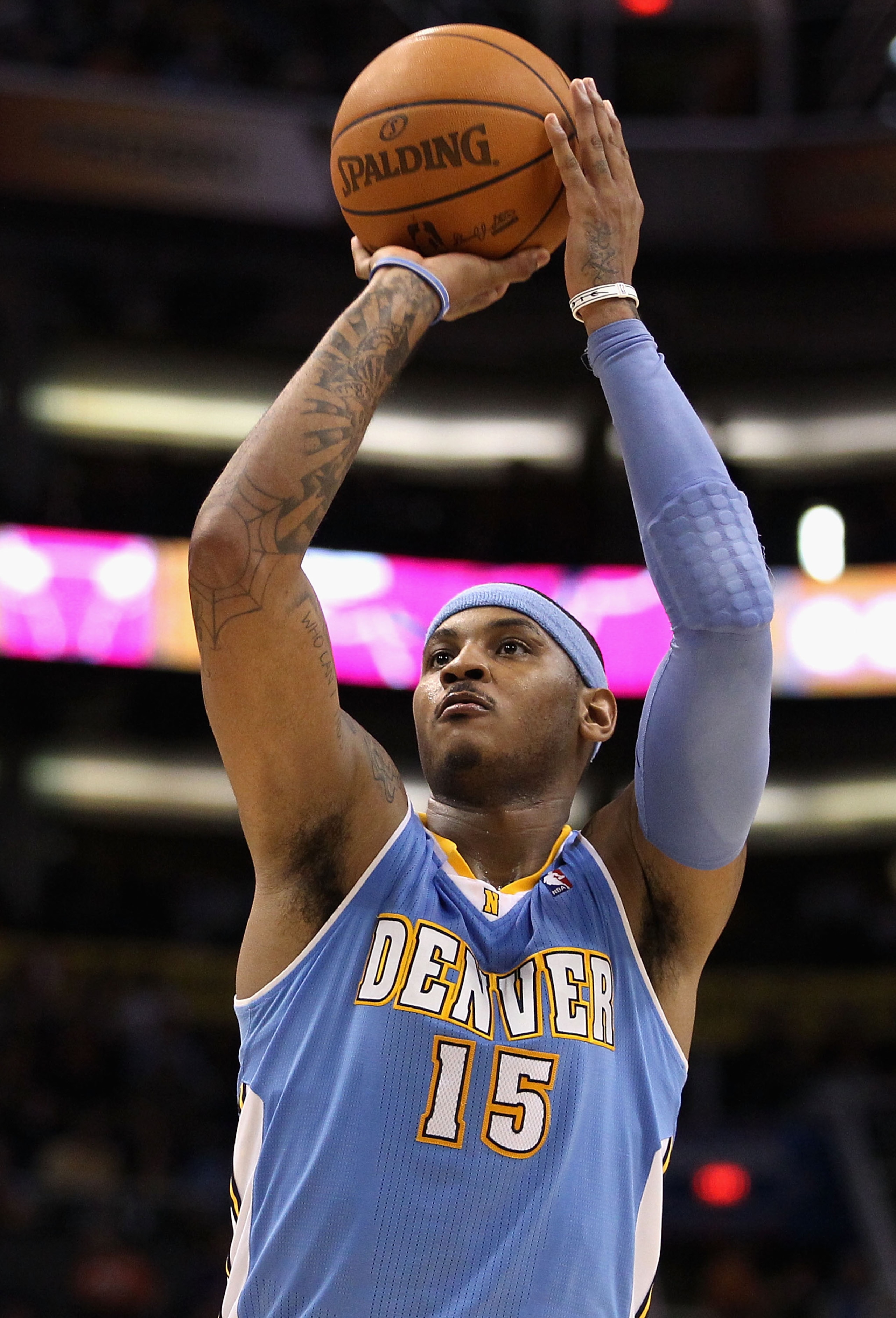 PHOENIX - NOVEMBER 15:  Carmelo Anthony #15 of the Denver Nuggets shoots a free throw shot during the NBA game against the Phoenix Suns at US Airways Center on November 15, 2010 in Phoenix, Arizona.  The Suns defeated the Nuggets 100-94.  NOTE TO USER: Us