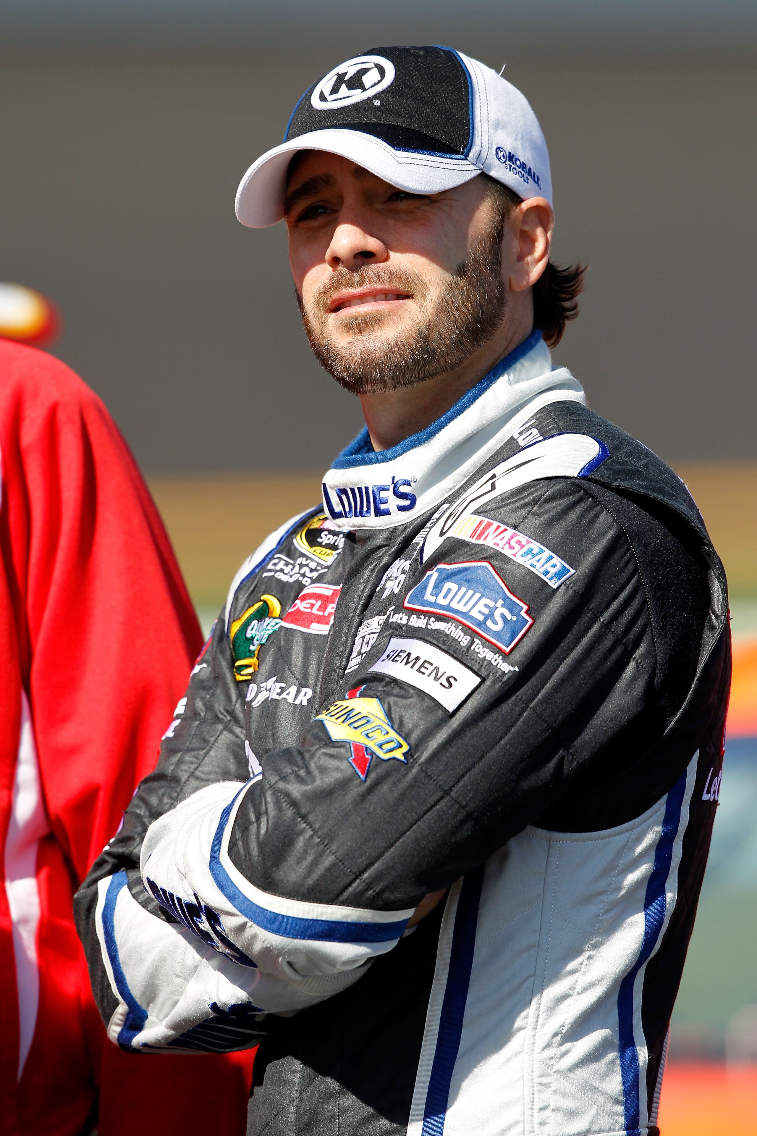 DAYTONA BEACH, FL - FEBRUARY 13: Jimmie Johnson, driver of the #48 Lowe's Chevrolet, looks on during qualifying for the NASCAR Sprint Cup Series Daytona 500 at Daytona International Speedway on February 13, 2011 in Daytona Beach, Florida. (Photo by Matt DAYTONA BEACH, FL - FEBRUARY 13: Jimmie Johnson, driver of the #48 Lowe's Chevrolet, looks on during qualifying for the NASCAR Sprint Cup Series Daytona 500 at Daytona International Speedway on February 13, 2011 in Daytona Beach, Florida. (Photo by Matt