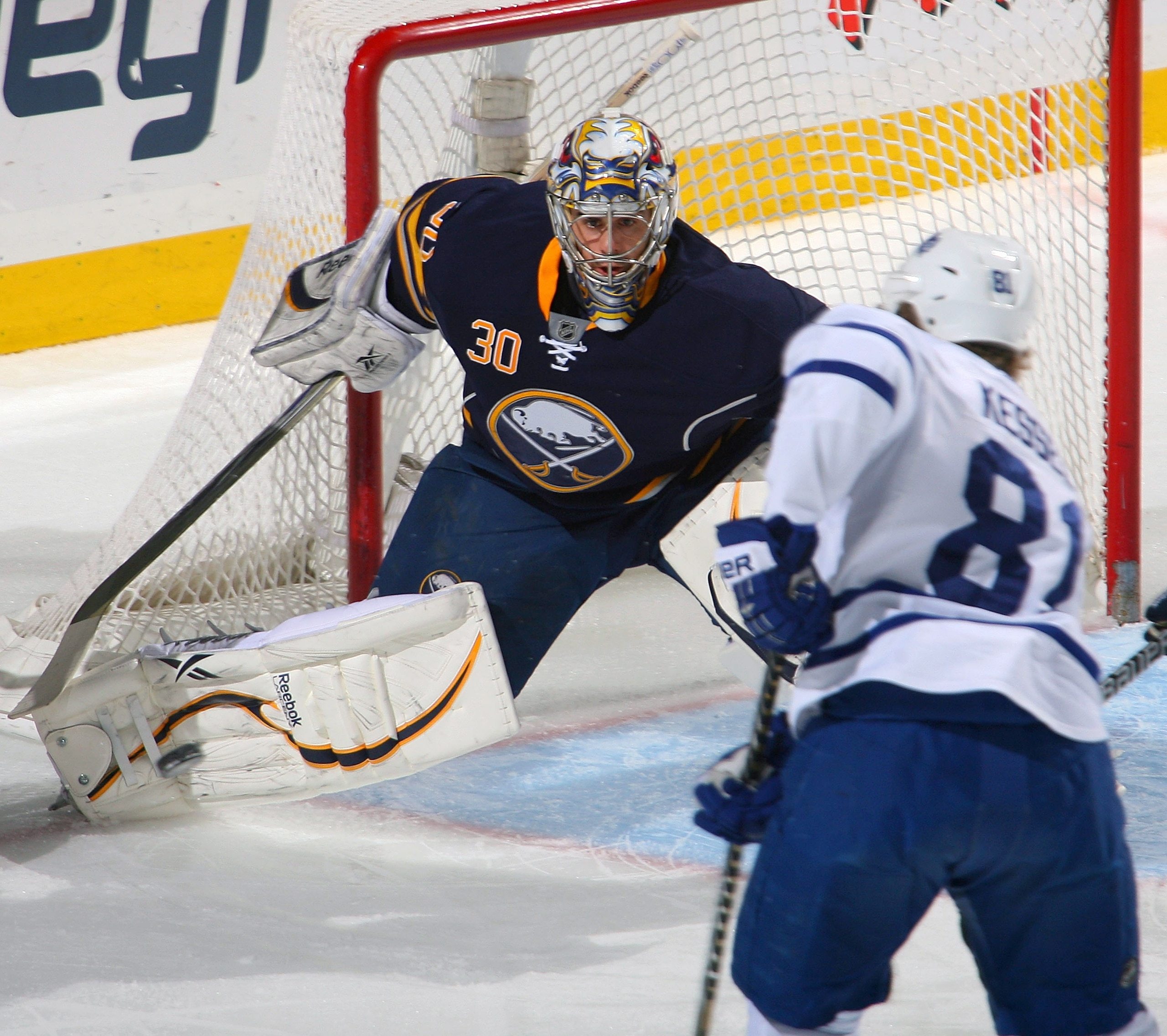 BUFFALO, NY - FEBRUARY 16: Ryan Miller #30 of the Buffalo Sabres moves to get in position against Phil Kessel #81 of the Toronto Maple Leafs at HSBC Arena on February 16, 2011 in Buffalo, New York.  (Photo by Rick Stewart/Getty Images)