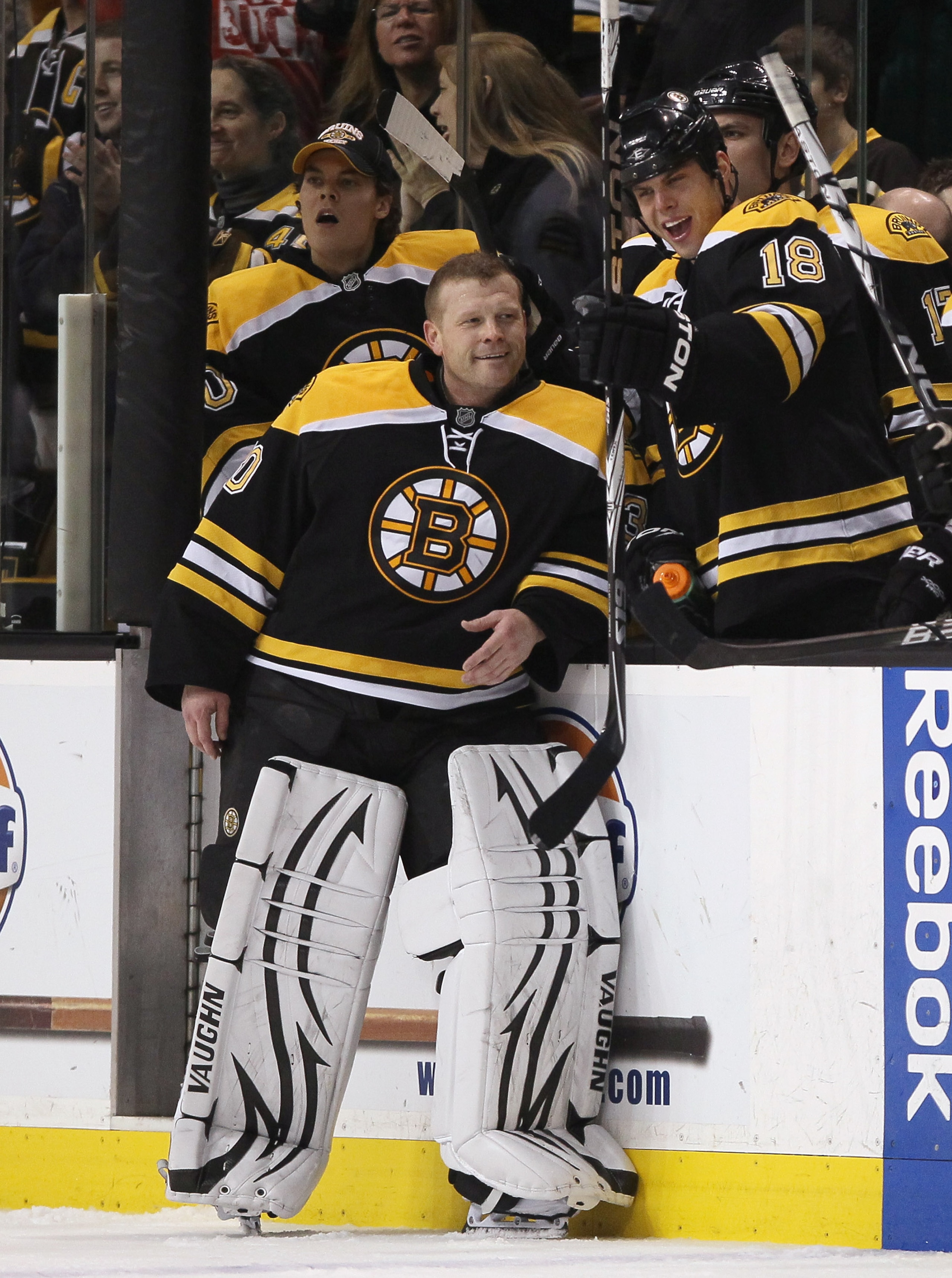 BOSTON, MA - FEBRUARY 09:  Tim Thomas #30 of the Boston Bruins is congratulated by Nathan Horton #18 after Thomas got into a fight with Carey Price of the Montreal Canadiens on February 9, 2011 at the TD Garden in Boston, Massachusetts.  (Photo by Elsa/Ge