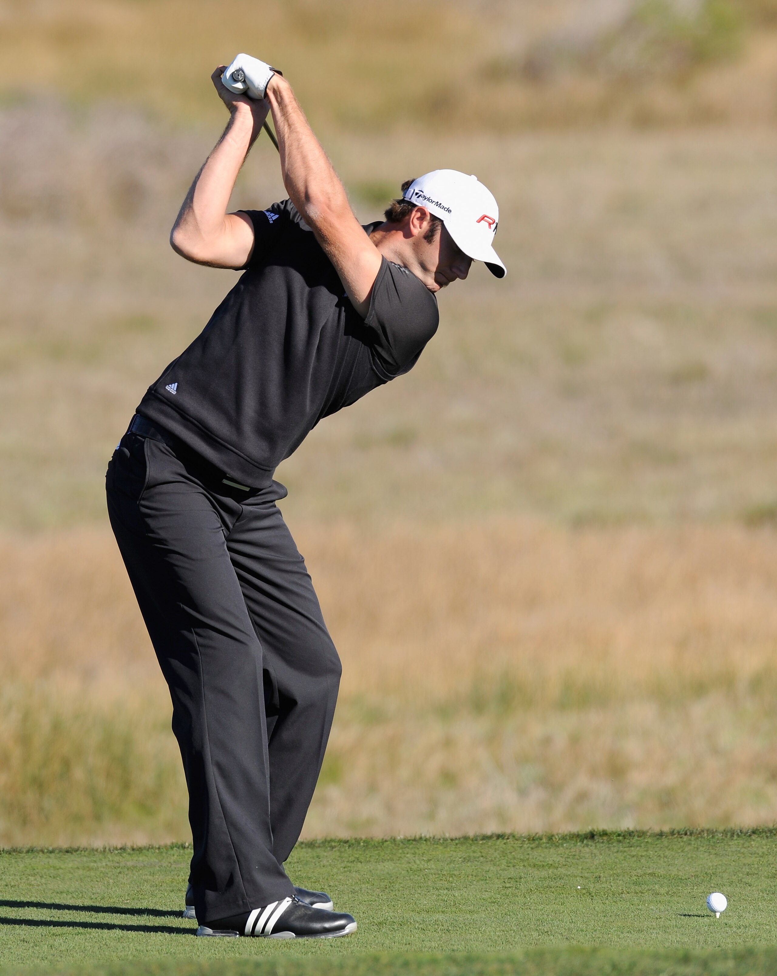 PEBBLE BEACH, CA - FEBRUARY 10: Dustin Johnson plays a shot during the first round of the AT&T Pebble Beach National Pro-Am at Monterey Peninsula Country Club on February 10, 2011 in Pebble Beach, California. (Photo by Stuart Franklin/Getty Images) PEBBLE BEACH, CA - FEBRUARY 10: Dustin Johnson plays a shot during the first round of the AT&T Pebble Beach National Pro-Am at Monterey Peninsula Country Club on February 10, 2011 in Pebble Beach, California. (Photo by Stuart Franklin/Getty Images)