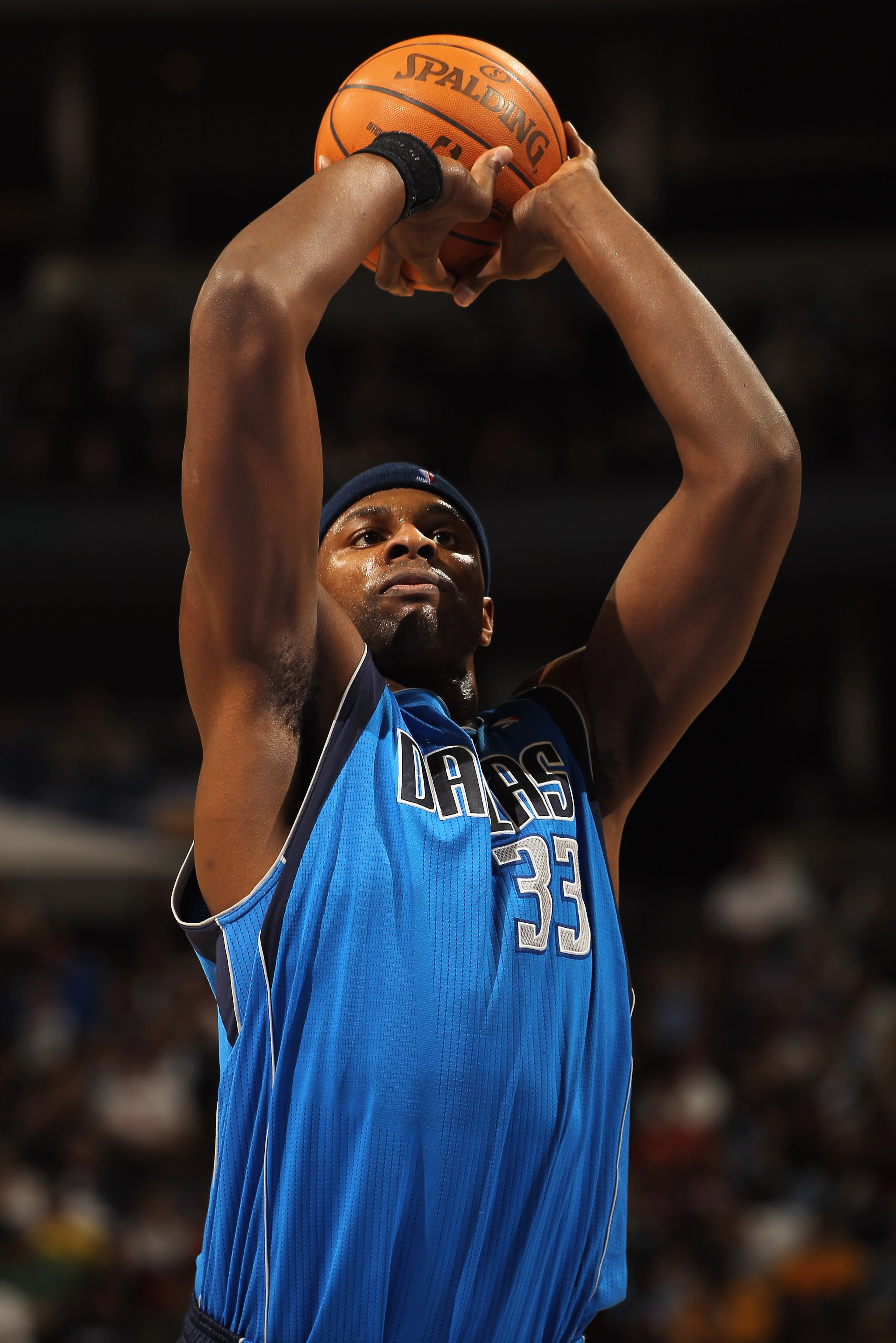 DENVER, CO - FEBRUARY 10:  Brendan Haywood #33 of the Dallas Mavericks takes a free throw against the Denver Nuggets during NBA action at the Pepsi Center on February 10, 2011 in Denver, Colorado. The Nuggets defeated the Mavericks 121-120. NOTE TO USER: