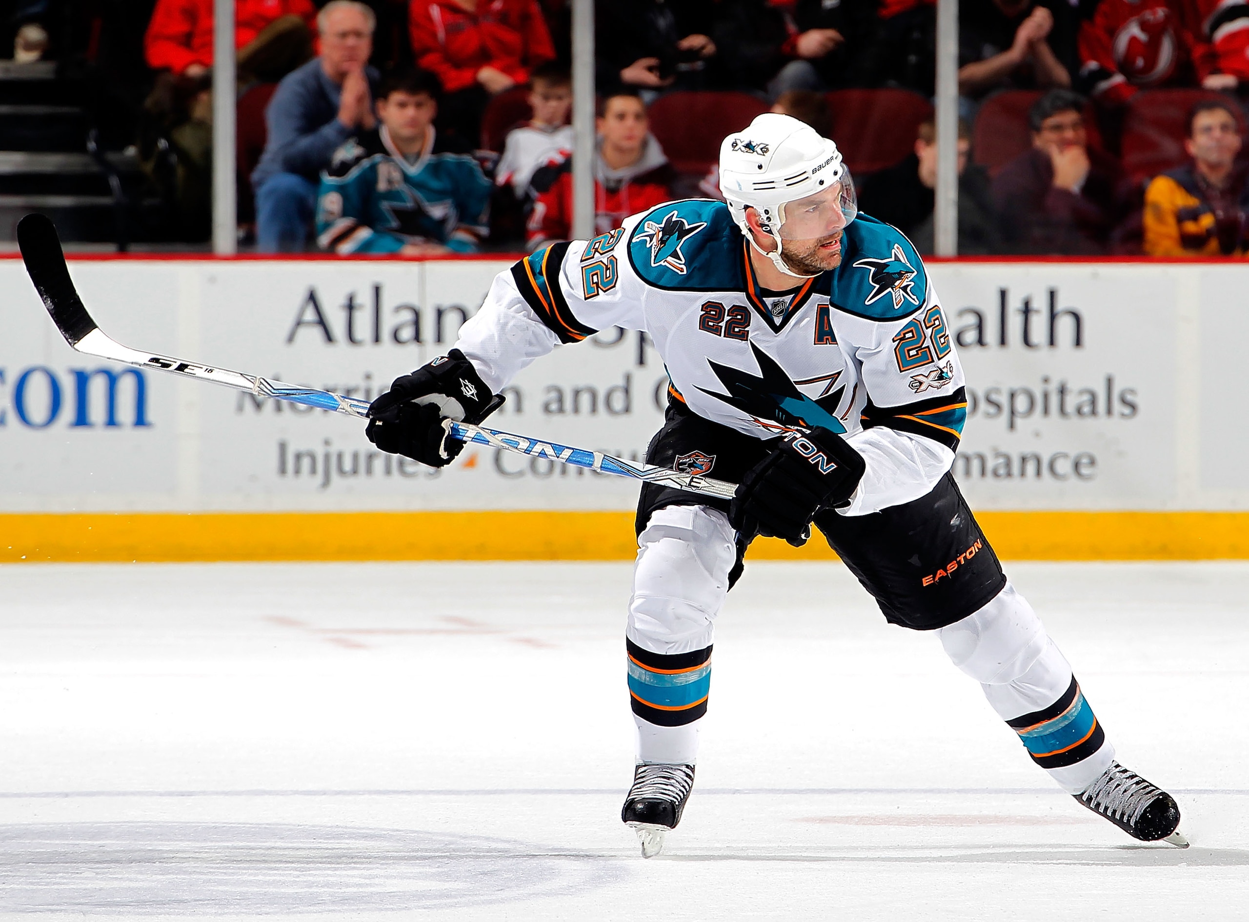 NEWARK, NJ - FEBRUARY 11: Dan Boyle #22 of the San Jose Sharks skates during an NHL hockey game against the New Jersey Devils on February 11, 2011 at the Prudential Center in Newark, New Jersey. (Photo by Paul Bereswill/Getty Images)