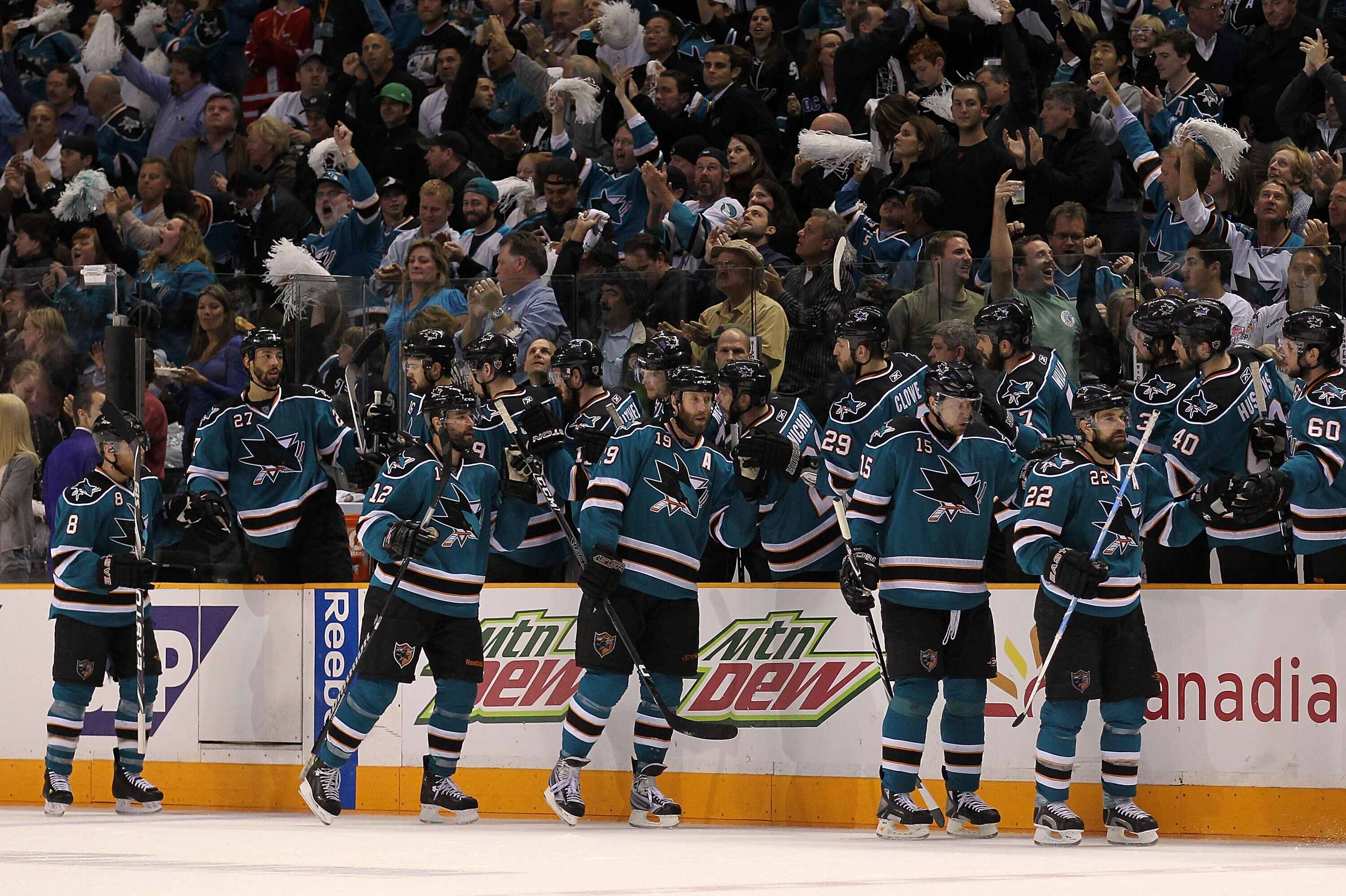 SAN JOSE, CA - MAY 18:  (2nd L) Patrick Marleau #12 of the San Jose Sharks celebrates with his teammates after his second period goal against the Chicago Blackhawks in Game Two of the Western Conference Finals during the 2010 NHL Stanley Cup Playoffs at H