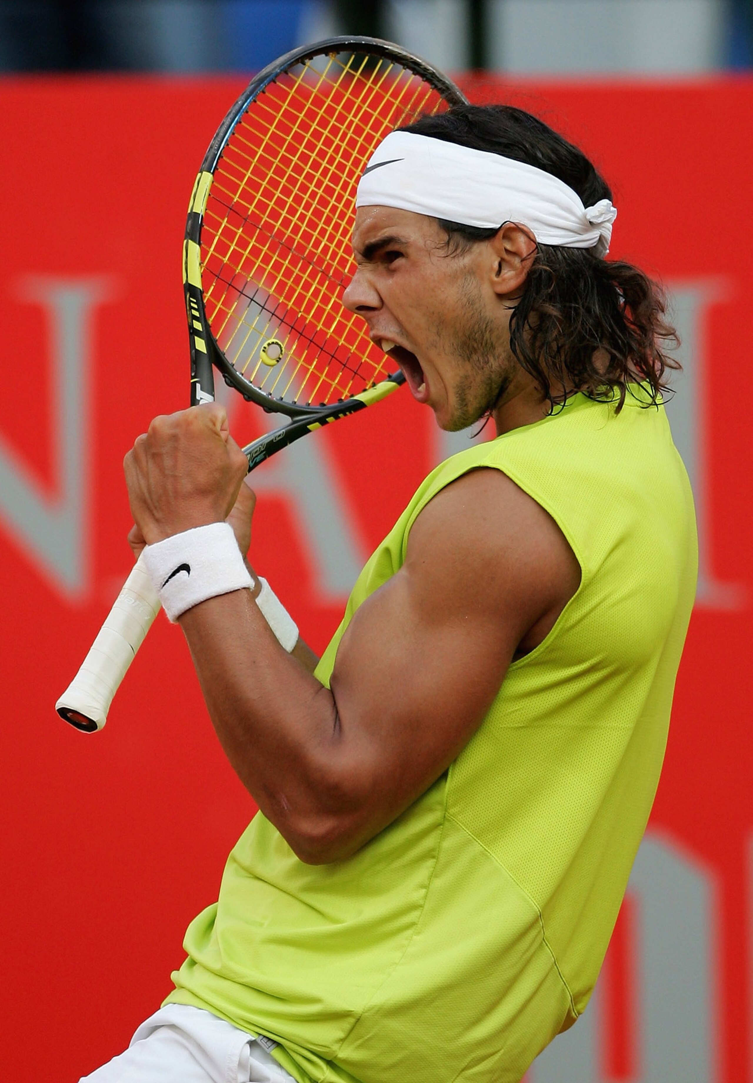 ROME - MAY 14:  Rafael Nadal of Spain celebrates winning a point in his match against Roger Federer of Switzerland in the final during the ATP Masters Series at Foro Italico on May 14, 2006 in Rome, Italy.  (Photo by Julian Finney/Getty Images)