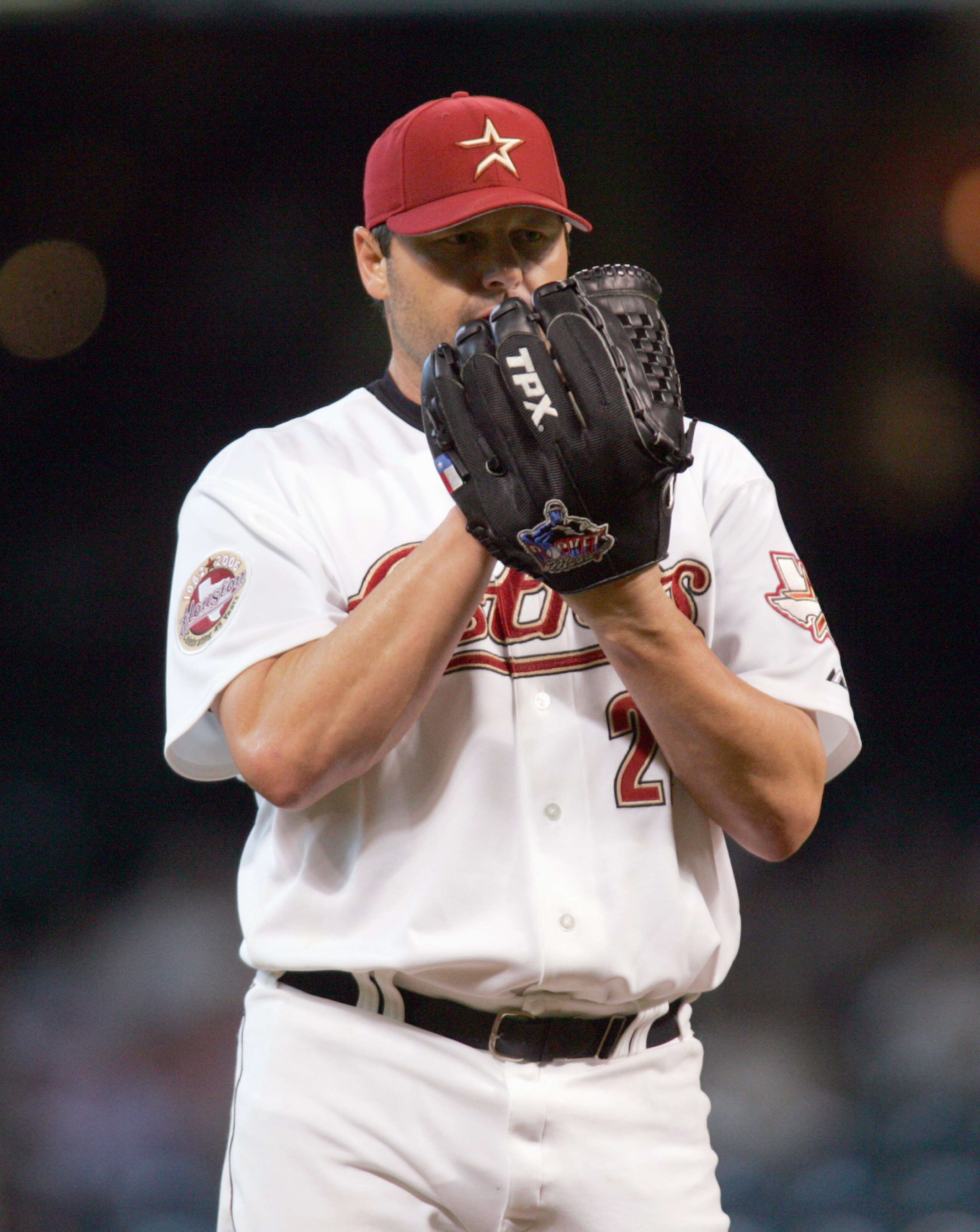 HOUSTON - SEPTEMBER 20: Pitcher Roger Clemens #22 of the Houston Astros lines up a pitch during his final scheduled home game of the season against the Cincinnati Reds on September 20, 2006 at Minute Maid Park in Houston, Texas. (Photo by Ronald Martinez/
