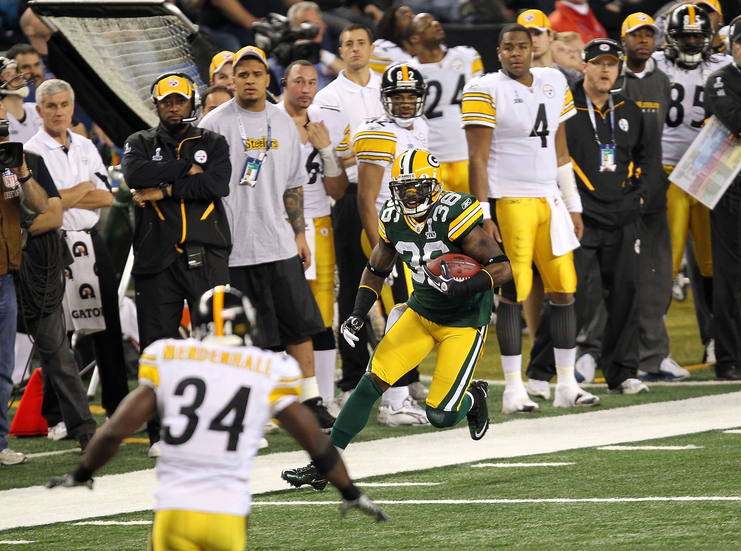 ARLINGTON, TX - FEBRUARY 06: Nick Collins #36 of the Green Bay Packers returns an interception for a touchdown against Rashard Mendenhall #34 of the Pittsburgh Steelers during Super Bowl XLV at Cowboys Stadium on February 6, 2011 in Arlington, Texas. (P ARLINGTON, TX - FEBRUARY 06: Nick Collins #36 of the Green Bay Packers returns an interception for a touchdown against Rashard Mendenhall #34 of the Pittsburgh Steelers during Super Bowl XLV at Cowboys Stadium on February 6, 2011 in Arlington, Texas. (P