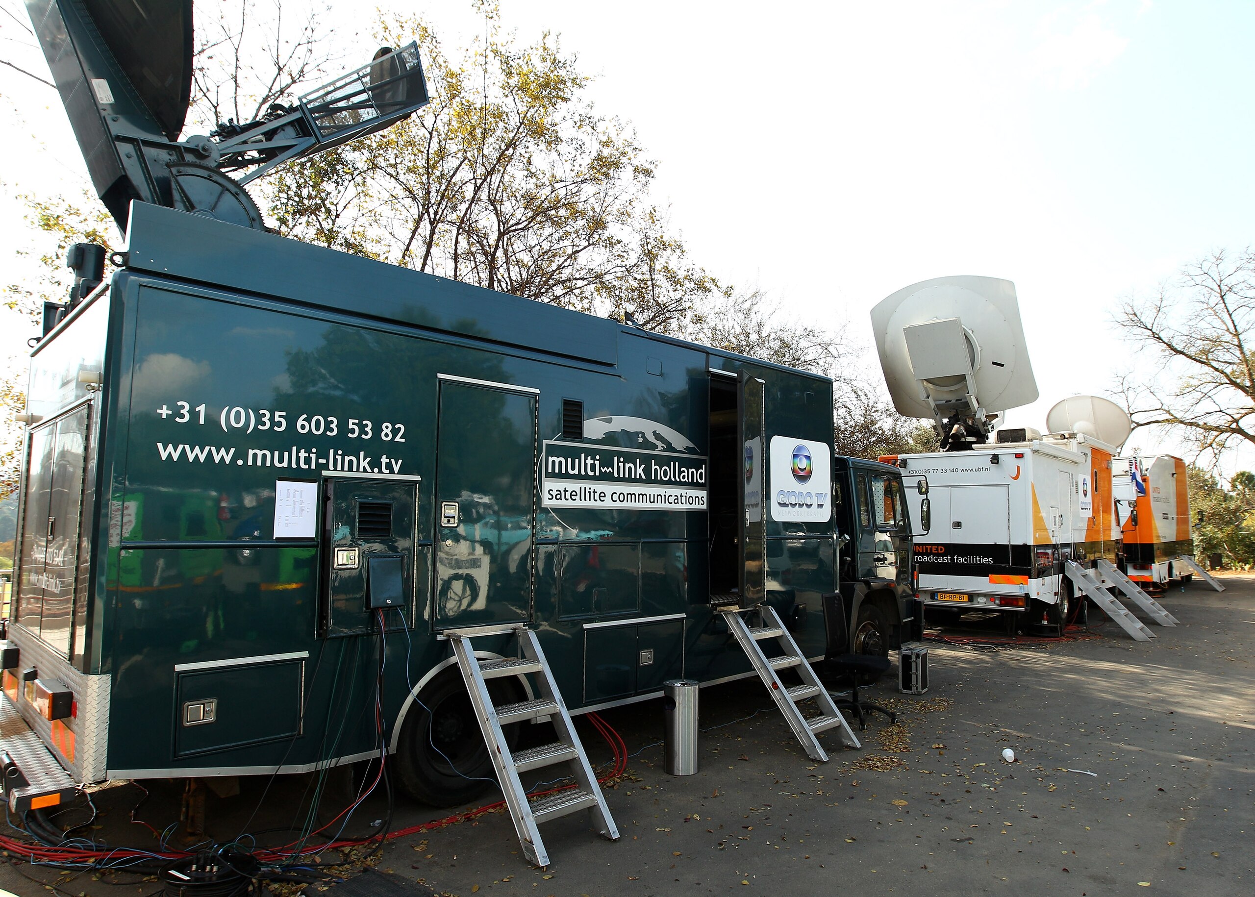 JOHANNESBURG, SOUTH AFRICA - JUNE 13:  A view of the satellite trucks outside The Fairways Hotel at Randpark Golf Club, where the Brazil national team are staying on June 13, 2010 in Johannesburg, South Africa. The Brazil national team are in South Africa