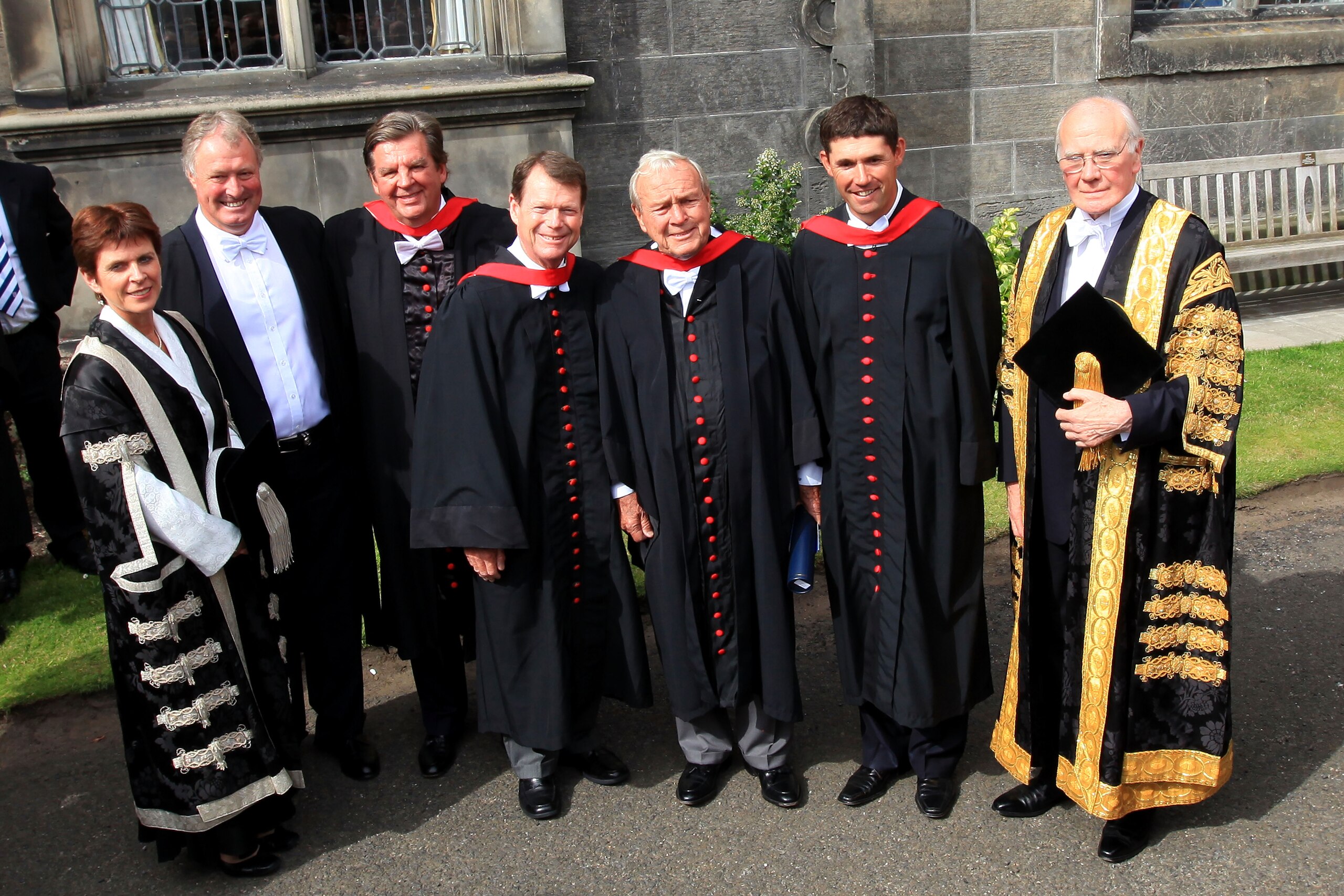 ST ANDREWS, SCOTLAND - JULY 13: (L-R) Jim Farmer, Honorary Professional of the Royal and Ancient Golf Club of St. Andrews, Johann Rupert, CEO of Richemont Group, Tom Watson, Arnold Palmer, Padraig Harrington, Sir Menzies Campbell, University Chancellor, p