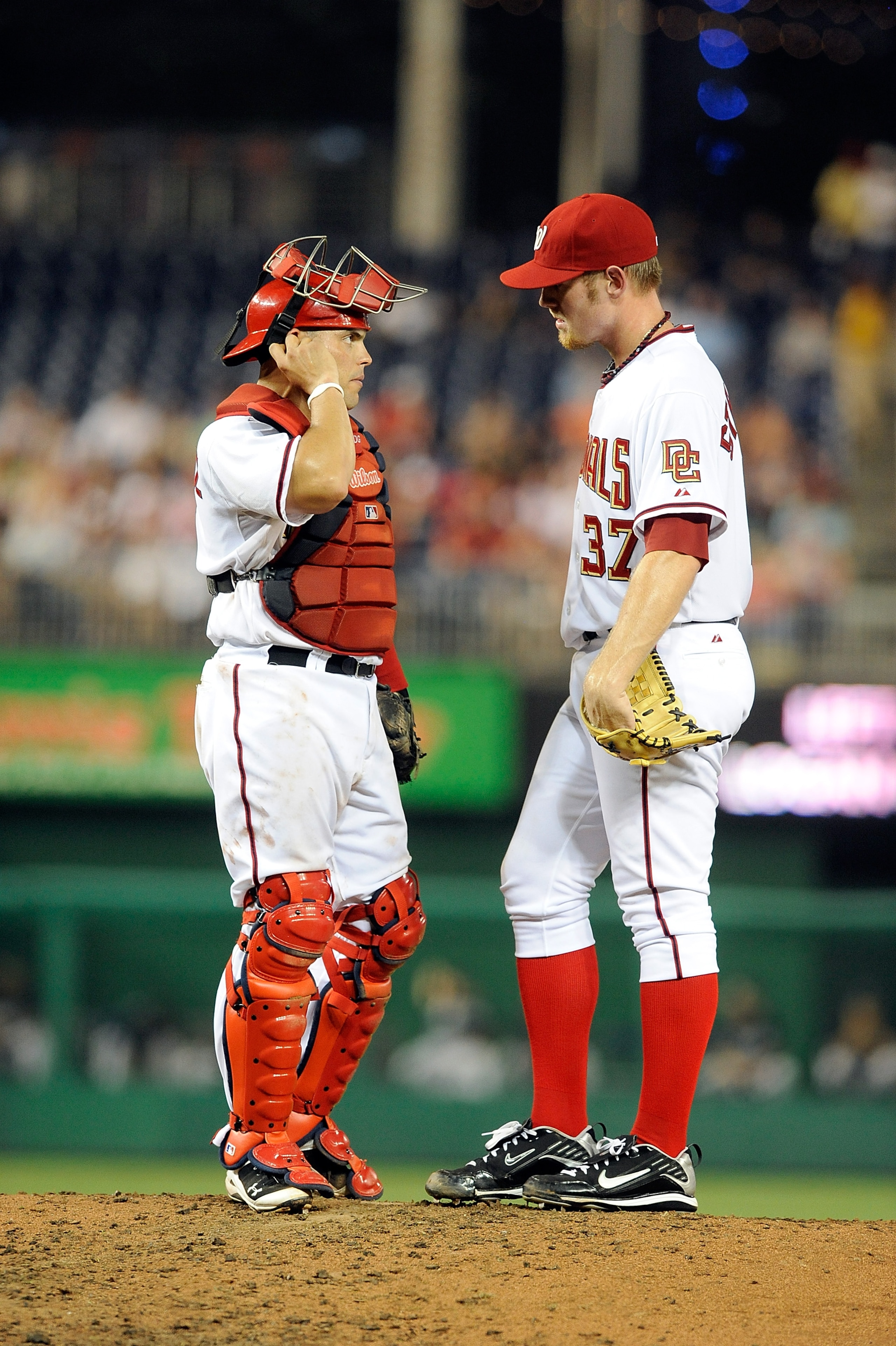 WASHINGTON - AUGUST 10:  Stephen Strasburg #37 of the Washington Nationals talks with Ivan Rodriguez #7 during the game against the Florida Marlins at Nationals Park on August 10, 2010 in Washington, DC.  (Photo by Greg Fiume/Getty Images)