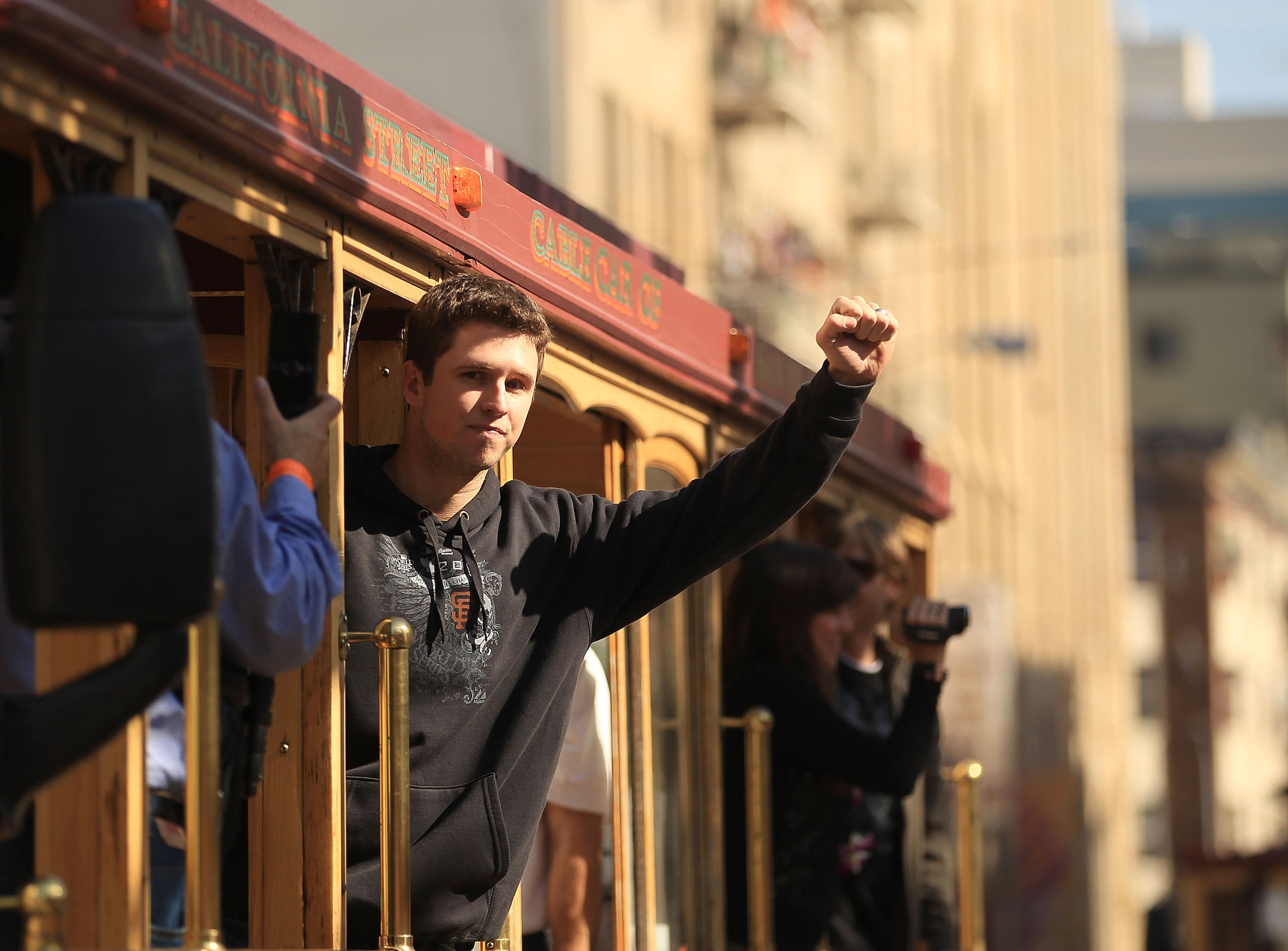 SAN FRANCISCO - NOVEMBER 03: Buster Posey of the San Francisco Giants waves to the crowd during the San Francisco Giants victory parade on November 3, 2010 in San Francisco, California. (Photo by Ezra Shaw/Getty Images) SAN FRANCISCO - NOVEMBER 03: Buster Posey of the San Francisco Giants waves to the crowd during the San Francisco Giants victory parade on November 3, 2010 in San Francisco, California. (Photo by Ezra Shaw/Getty Images)