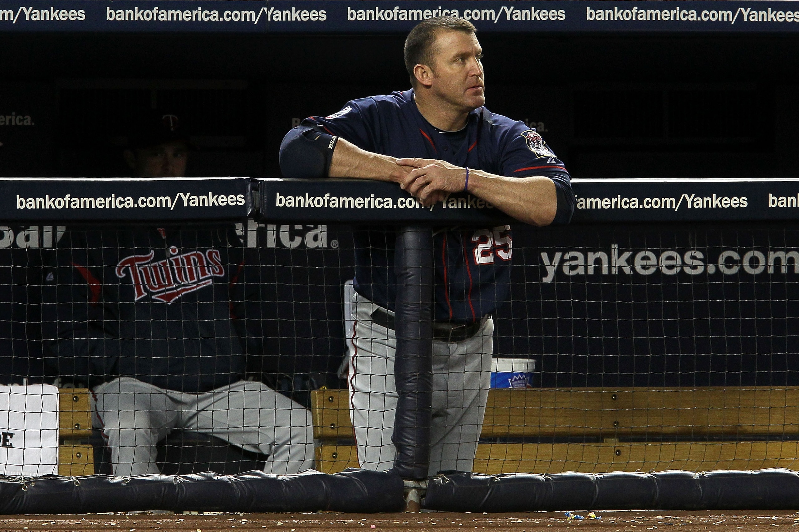 NEW YORK - OCTOBER 09:  Jim Thome #25 of the Minnesota Twins looks on dejected from the dugout against the New York Yankees  during Game Three of the ALDS part of the 2010 MLB Playoffs at Yankee Stadium on October 9, 2010 in the Bronx borough of New York