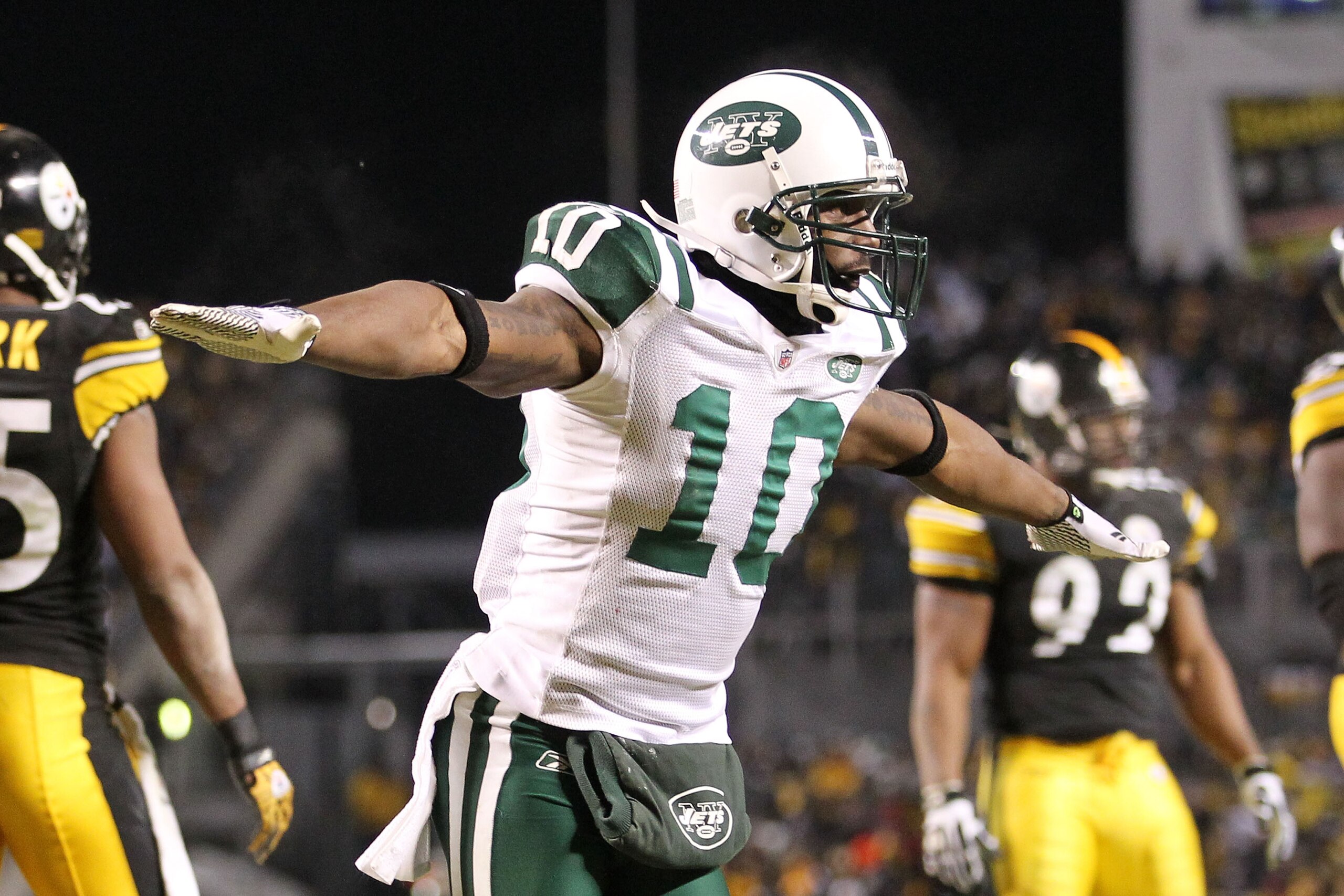 PITTSBURGH, PA - JANUARY 23:  Santonio Holmes #10 of the New York Jets celebrates during their 19 to 24 loss to the Pittsburgh Steelers in the 2011 AFC Championship game at Heinz Field on January 23, 2011 in Pittsburgh, Pennsylvania.  (Photo by Ronald Mar
