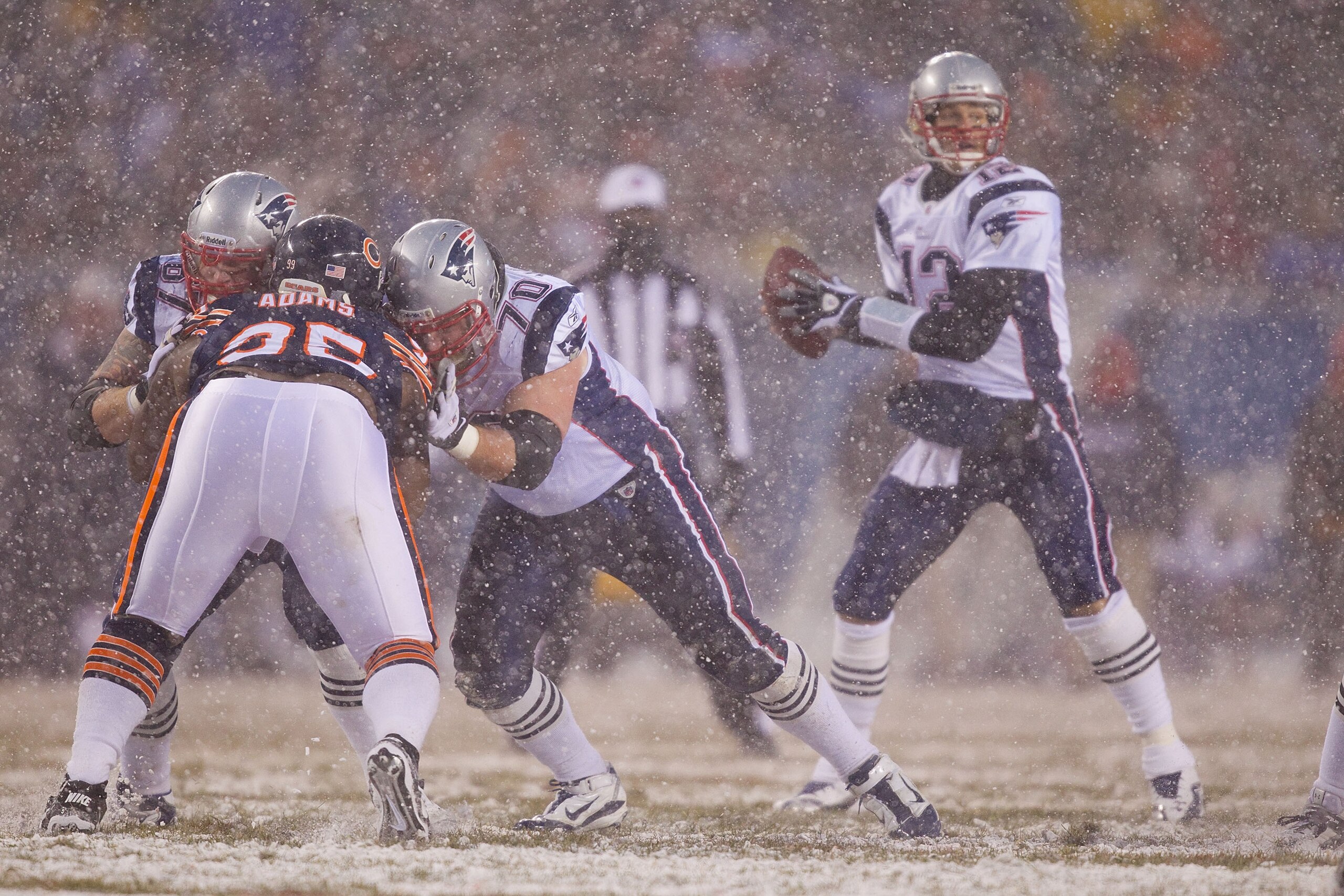 CHICAGO, IL - DECEMBER 12: Dan Koppen #67 and Logan Mankins #70 both of the New England Patriots block against the Chicago Bears at Soldier Field on December 12, 2010 in Chicago, Illinois.  The Patriots beat the Bears 36-7.  (Photo by Dilip Vishwanat/Gett