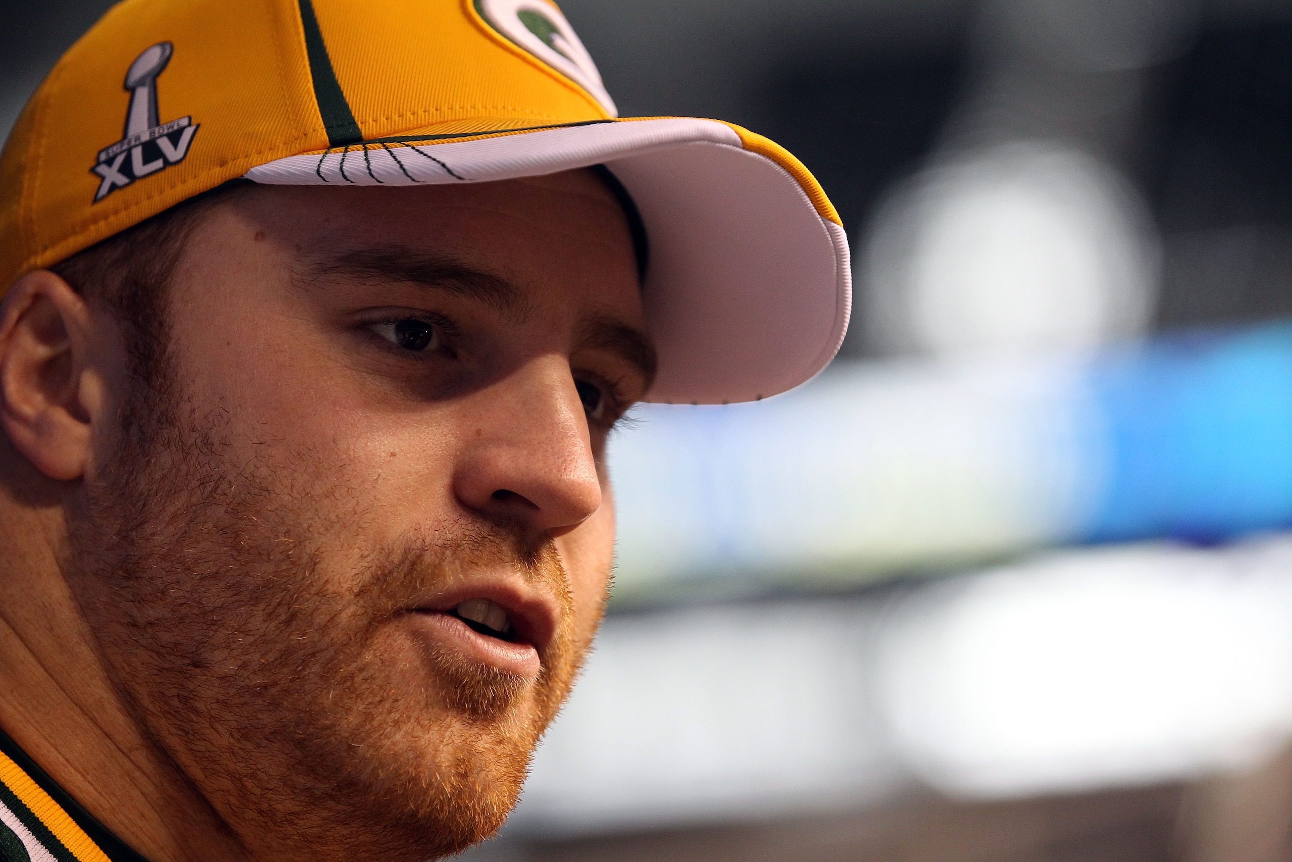 ARLINGTON, TX - FEBRUARY 01:  John Kuhn #30 of the Green Bay Packers addresses the media during Super Bowl XLV Media Day ahead of Super Bowl XLV at Cowboys Stadium on February 1, 2011 in Arlington, Texas. The Pittsburgh Steelers will play the Green Bay Pa