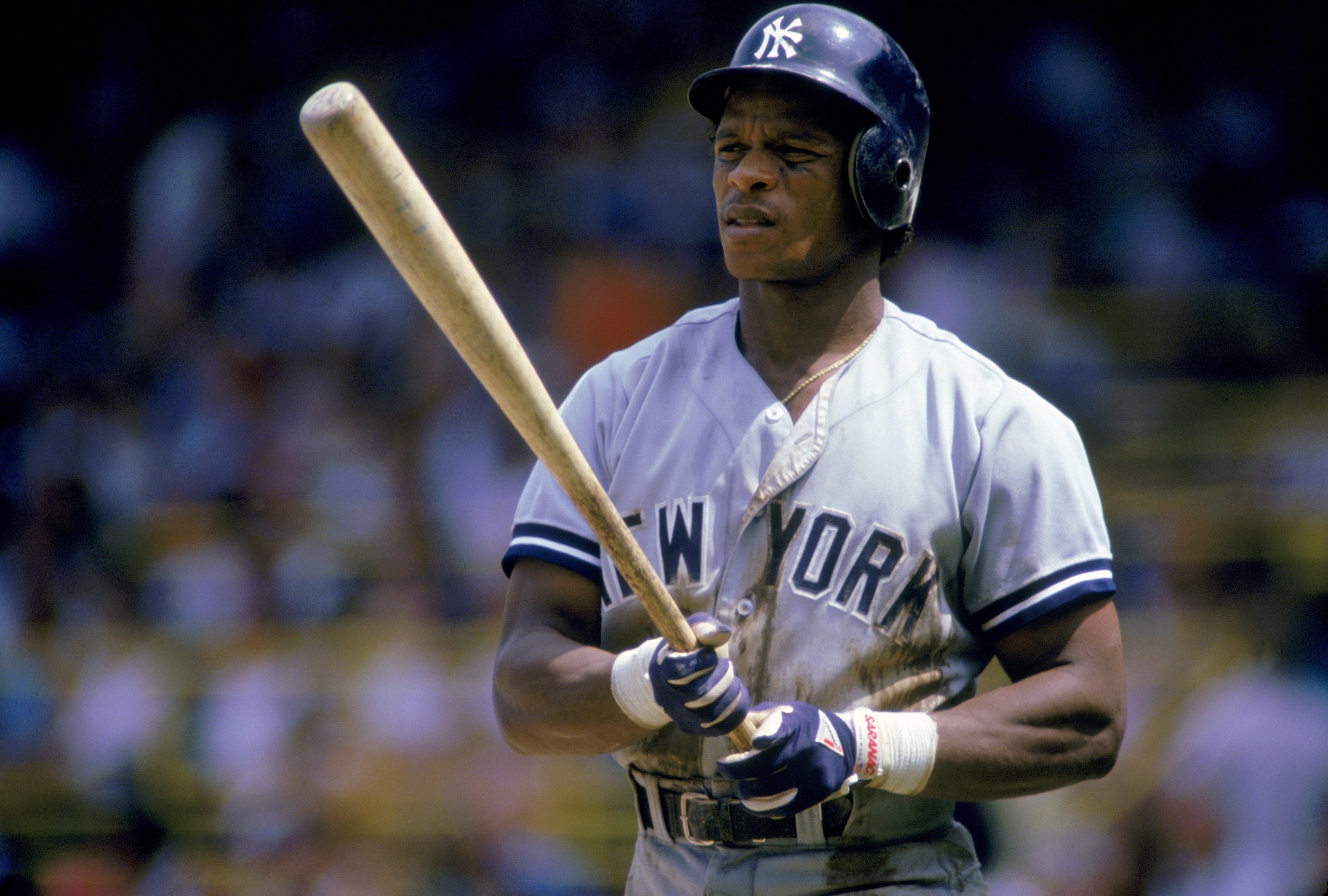 CHICAGO - 1987:  Rickey Henderson #24 of the New York Yankees looks on as he prepares to bat during a game against the Chicago White Sox in 1987 at Comiskey Park in Chicago, Illinois.  (Photo by Jonathan Daniel/Getty Images)