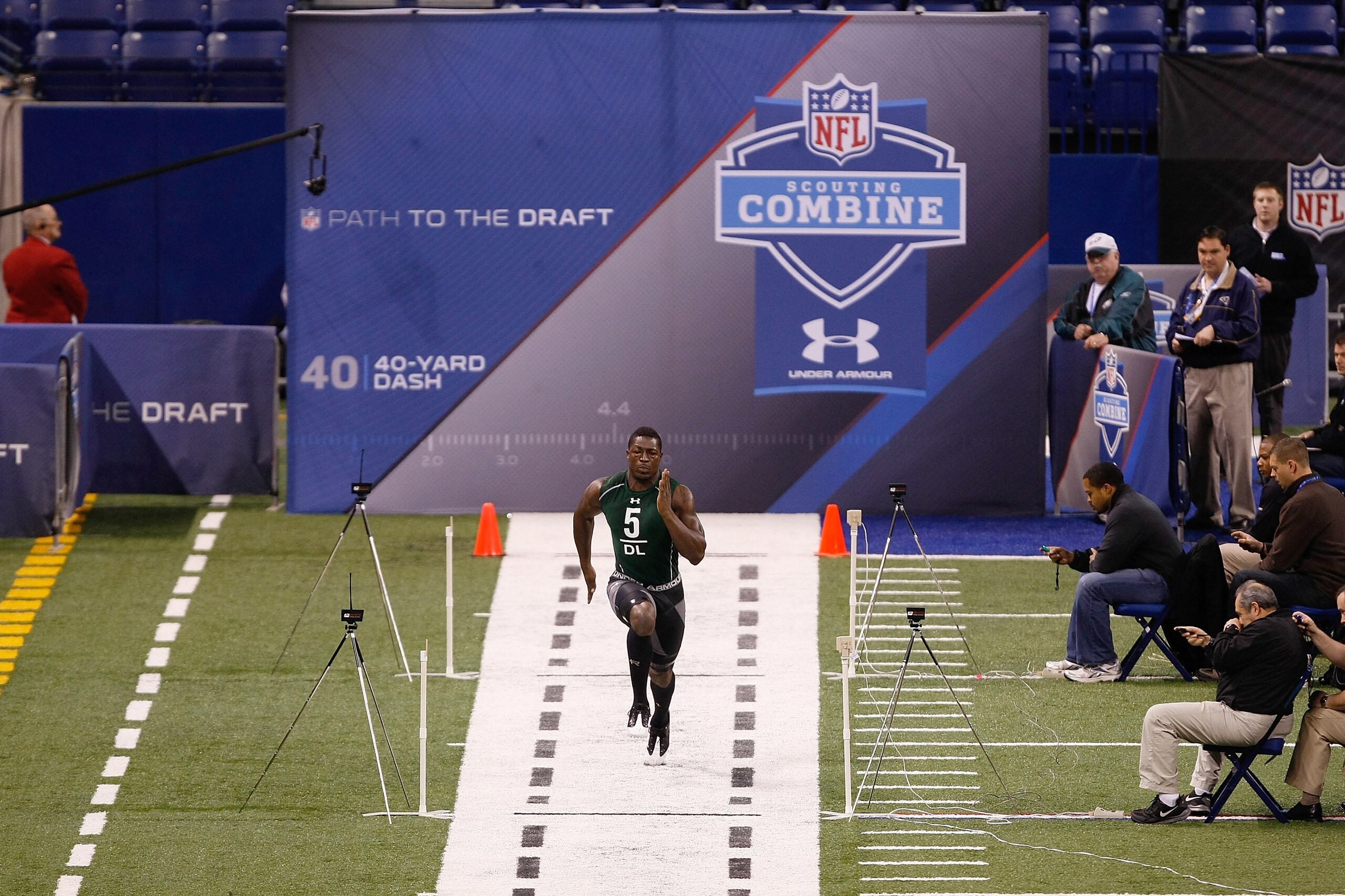 INDIANAPOLIS, IN - MARCH 1: Defensive lineman Kevin Basped of Nevada runs the 40 yard dash during the NFL Scouting Combine presented by Under Armour at Lucas Oil Stadium on March 1, 2010 in Indianapolis, Indiana. (Photo by Scott Boehm/Getty Images)