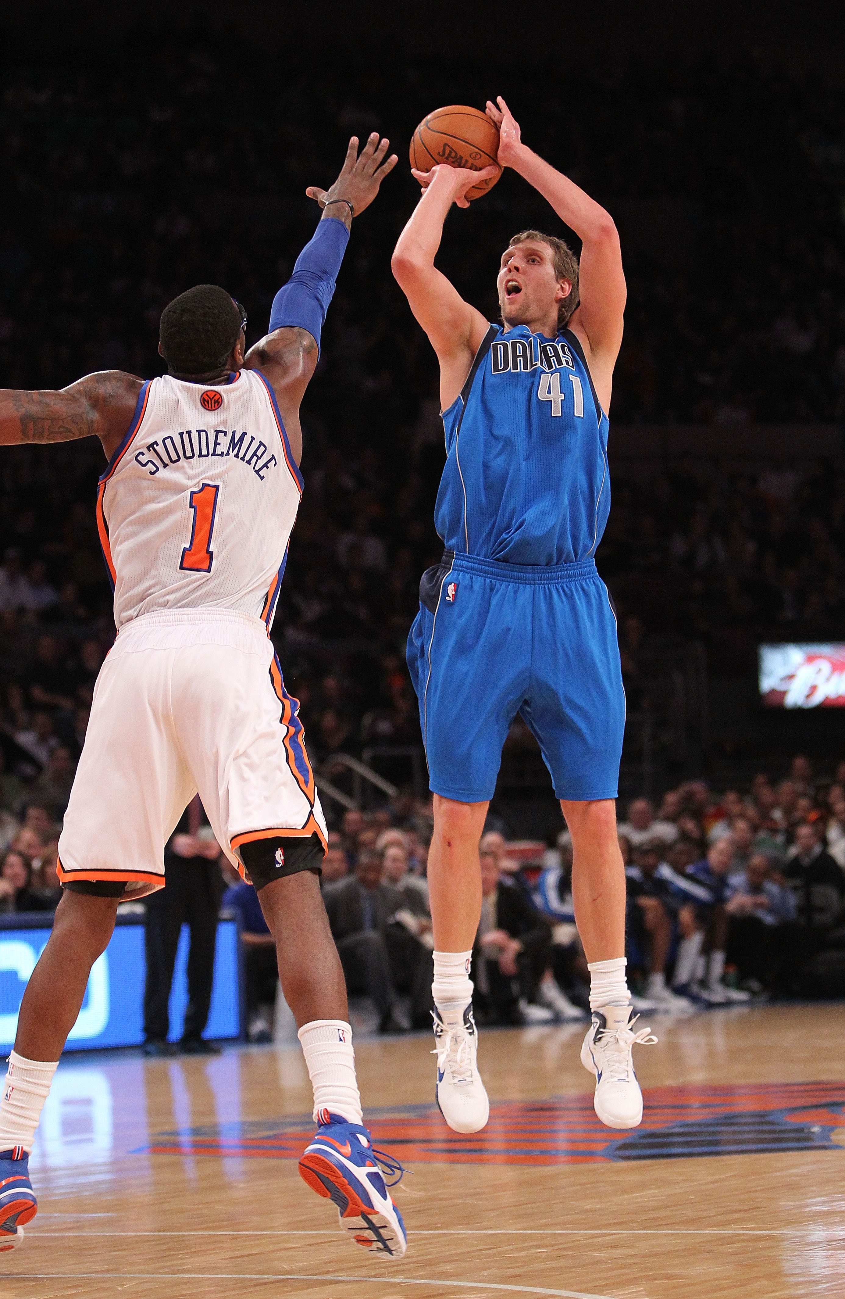 NEW YORK, NY - FEBRUARY 02: Dirk Nowitzki #41 of the Dallas Mavericks shoots over Amar'e Stoudemire #1 of the New York Knicks at Madison Square Garden on February 2, 2011 in New York City. NOTE TO USER: User expressly acknowledges and agrees that, by down