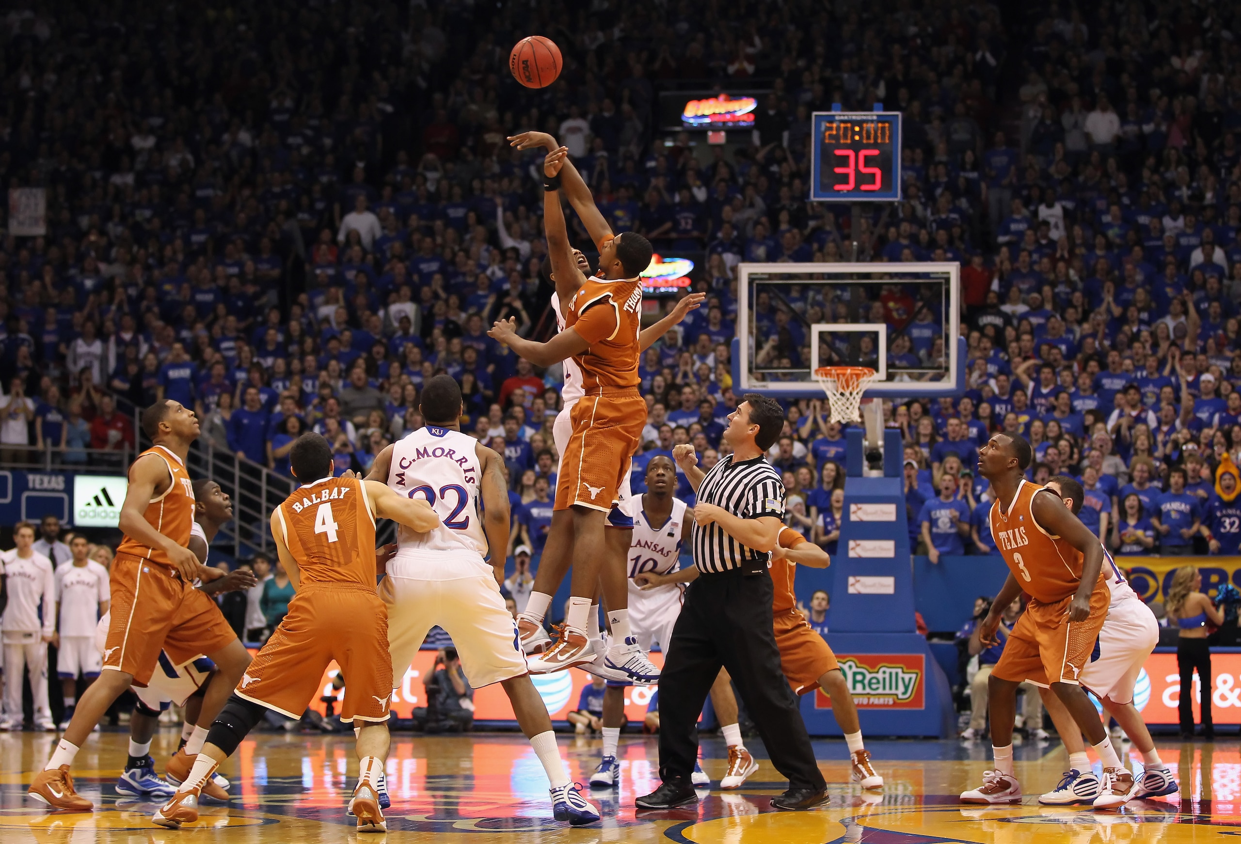 LAWRENCE, KS - JANUARY 22:  Tristan Thompson #13 of the Texas Longhorns wins the opening tip-off over Markieff Morris #21 of the Kansas Jayhawks during the game on January 22, 2011 at Allen Fieldhouse in Lawrence, Kansas.  (Photo by Jamie Squire/Getty Ima