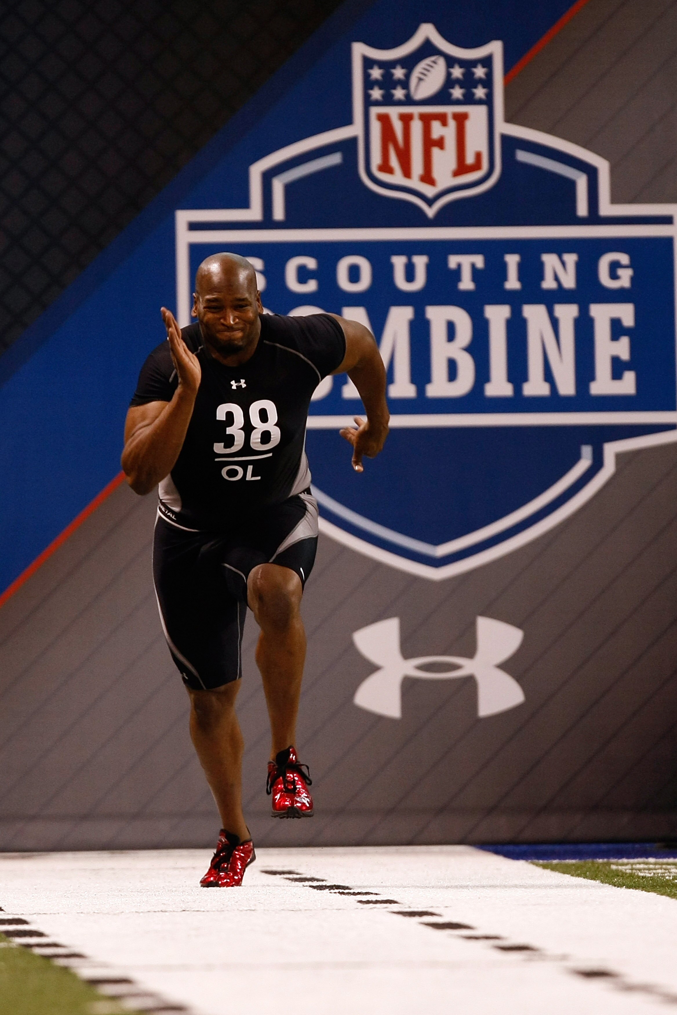 INDIANAPOLIS, IN - FEBRUARY 21:  Offensive lineman Eugene Monroe of Virginia runs the 40 yard dash as he participates in drills during the NFL Scouting Combine presented by Under Armour at Lucas Oil Stadium on February 21, 2009 in Indianapolis, Indiana. (